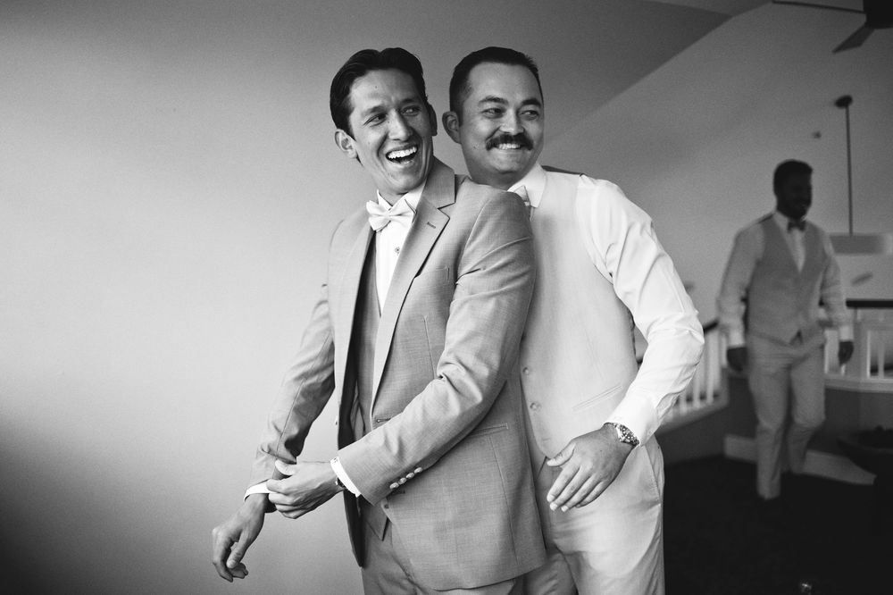 A series of black and white photos showing a couple dancing together in an intimate moment.