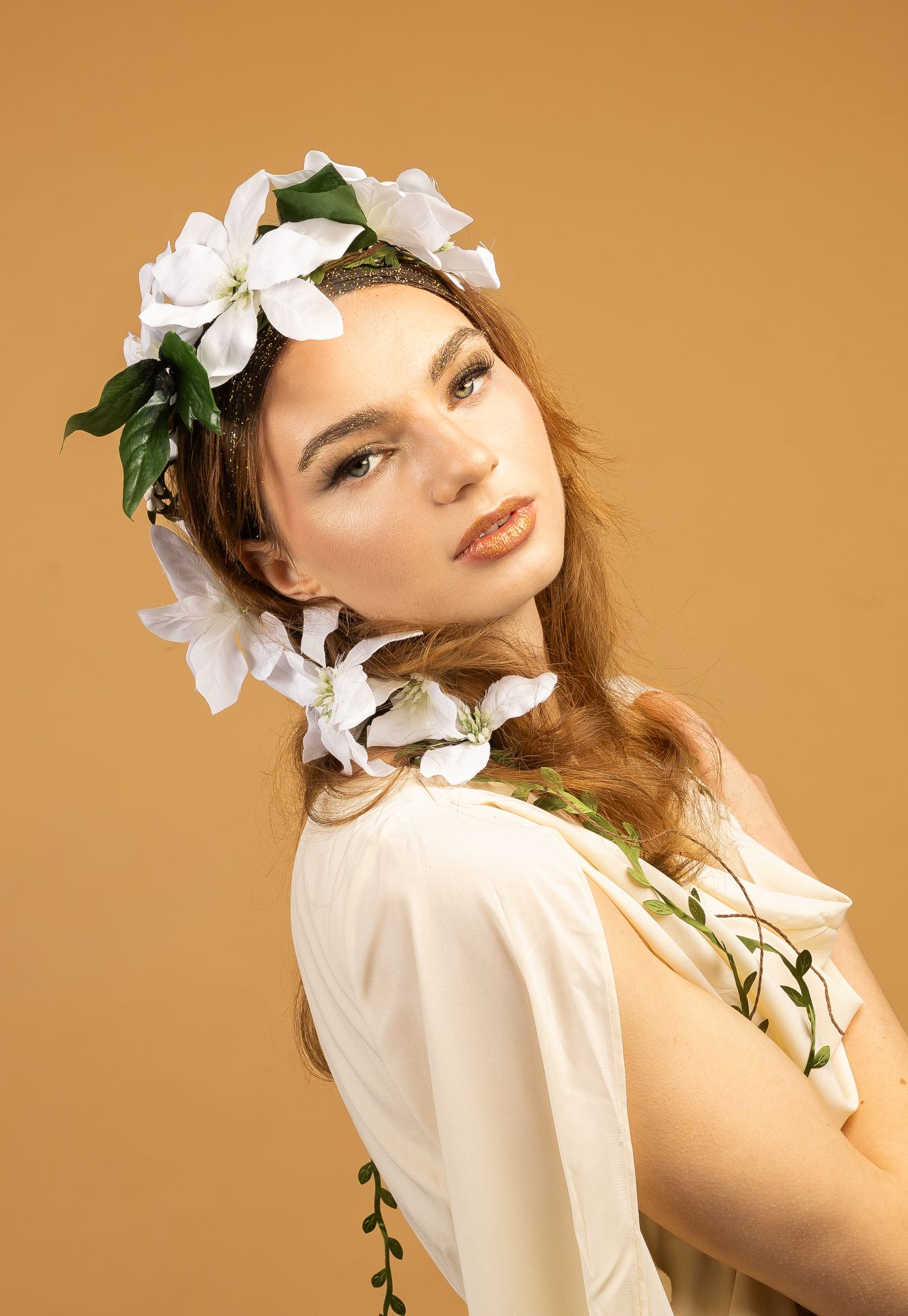 Gaia, Goddess of Earth.  Girl with flowers in her hair & sparkly makeup - angle 1
