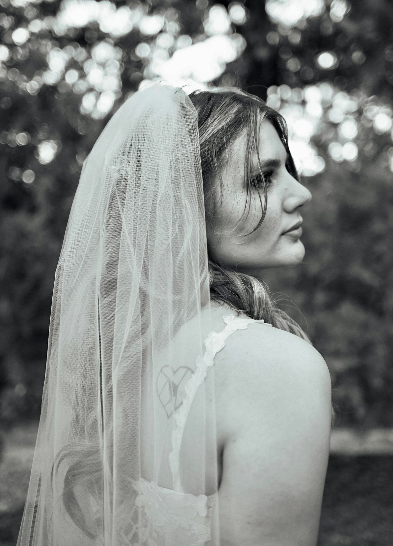 A timeless black and white portrait of a bride on her wedding day