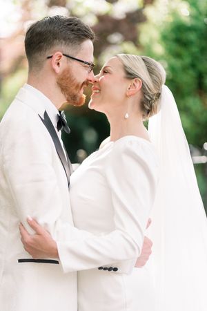 Newlyweds smiling at each other just after saying “I do” at Arnold Registry Office in Nottingham