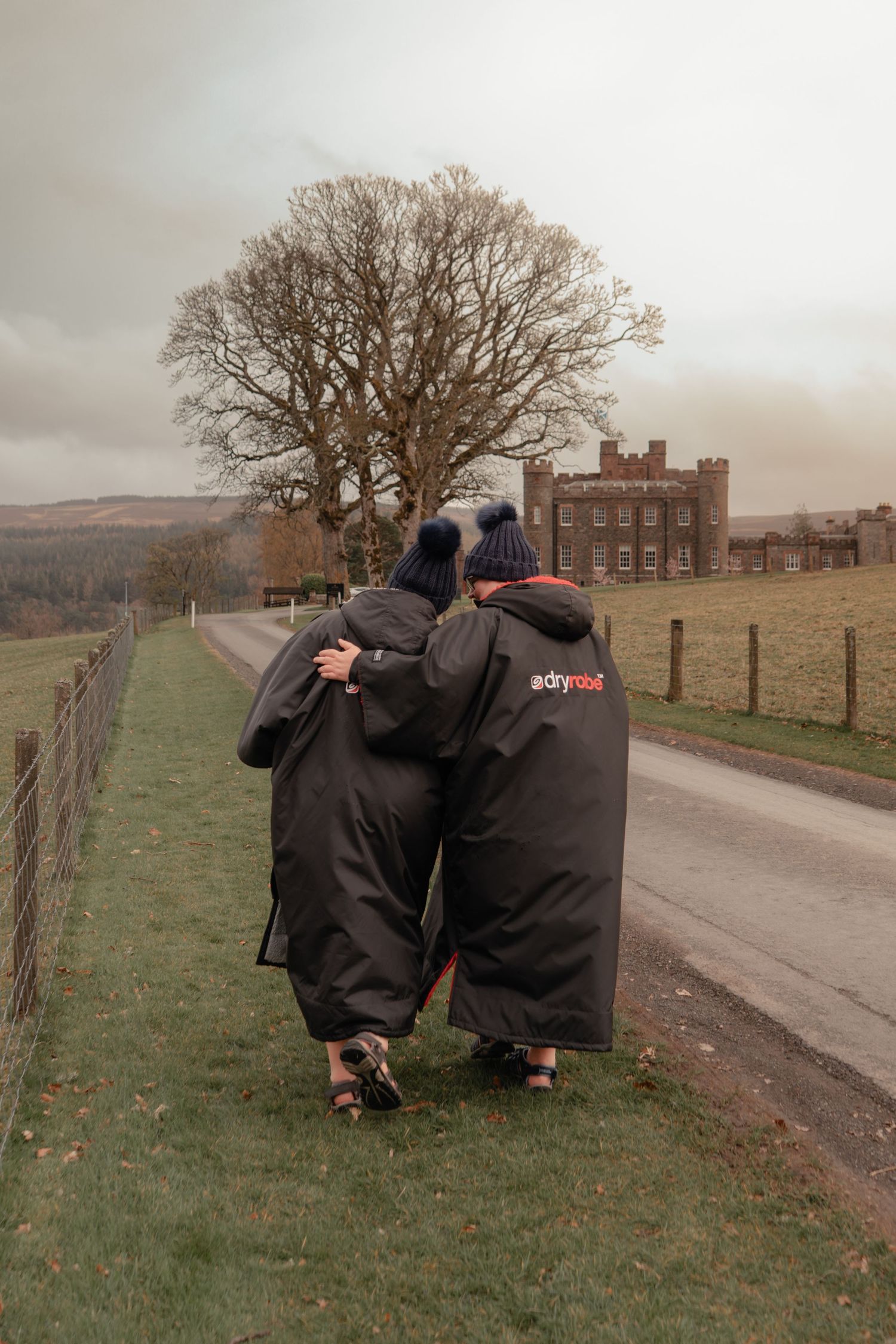 Couple return to Stobo Castle after their elopement in the Scottish Borders captured by Scottish intimate wedding photographer