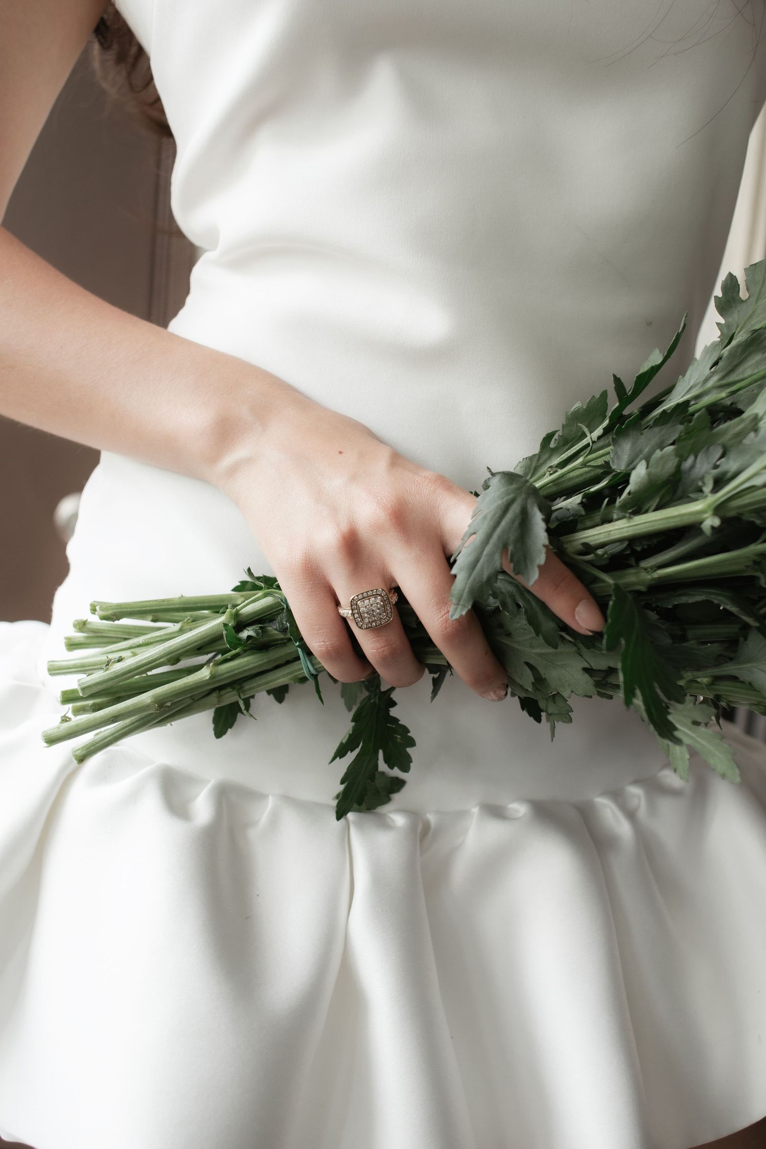 Bride's hand holding bouquet in Miami