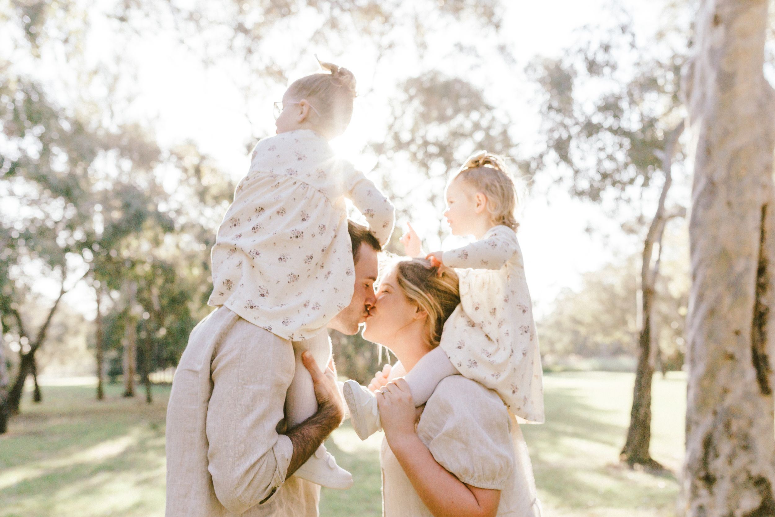 Romantic golden hour photo collage featuring an outdoor engagement session in a sunlit grove.