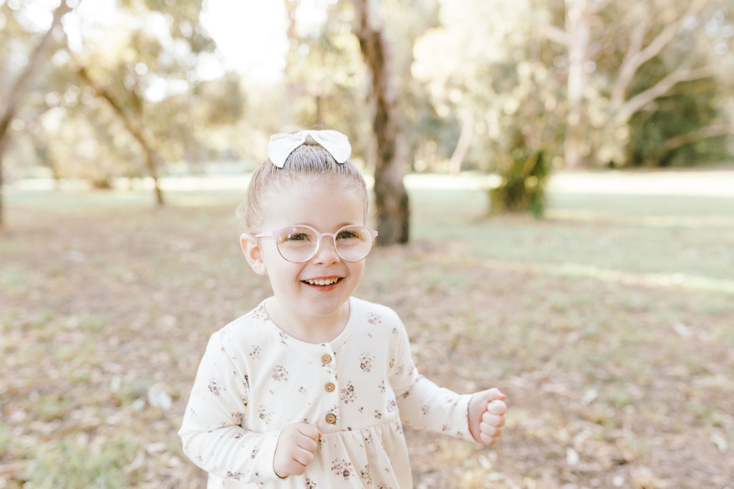 A set of six light and airy family portraits taken outdoors with soft natural lighting and a dreamy pastel aesthetic.