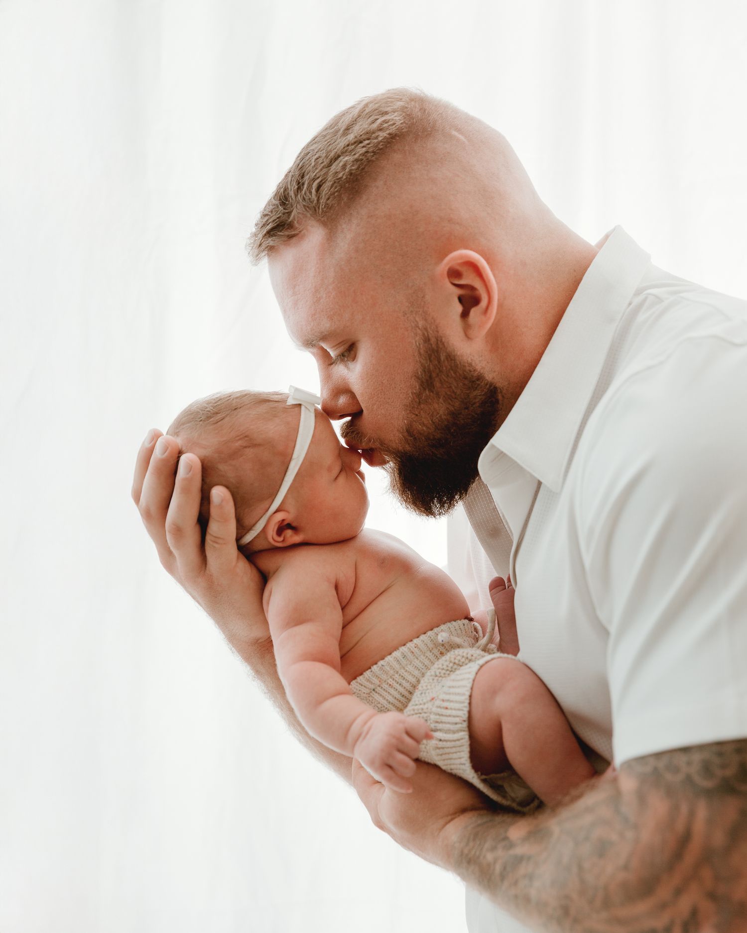 In home newborn session with background portraits photographer Tyler Texas