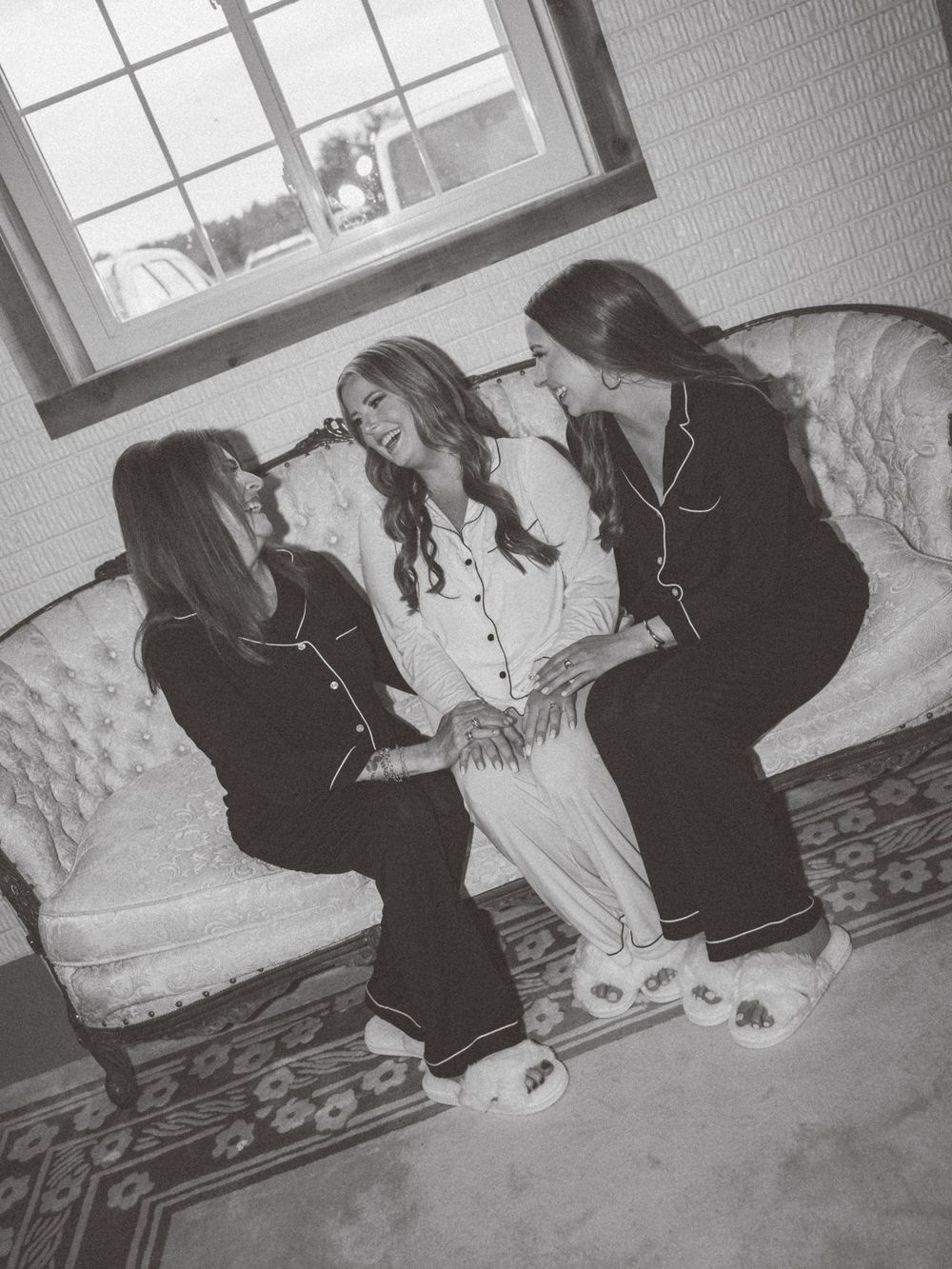 Black and white candid moments captured during wedding preparations.