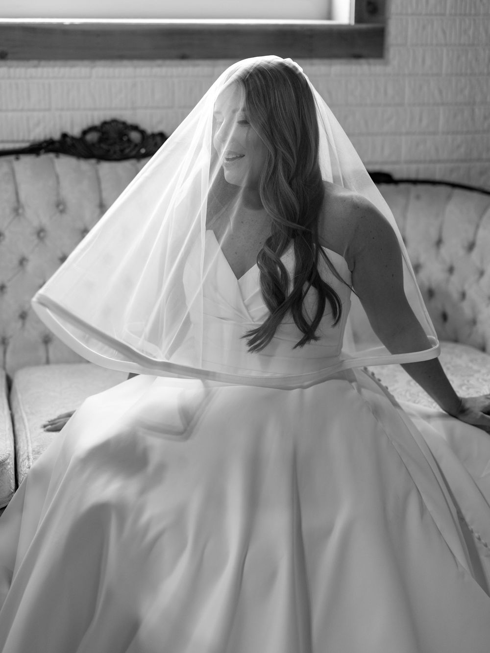 Sequence of elegant white wedding dress and veil in natural light.