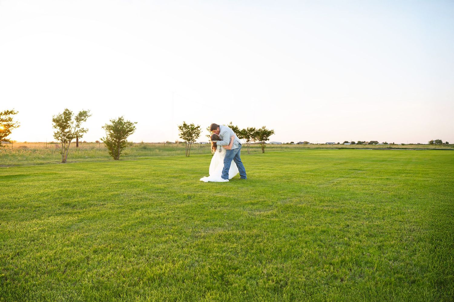 midland tx wedding photographer photographers midland tx diamond hill wedding venue bride and groom sunset photos wedding couple dipping