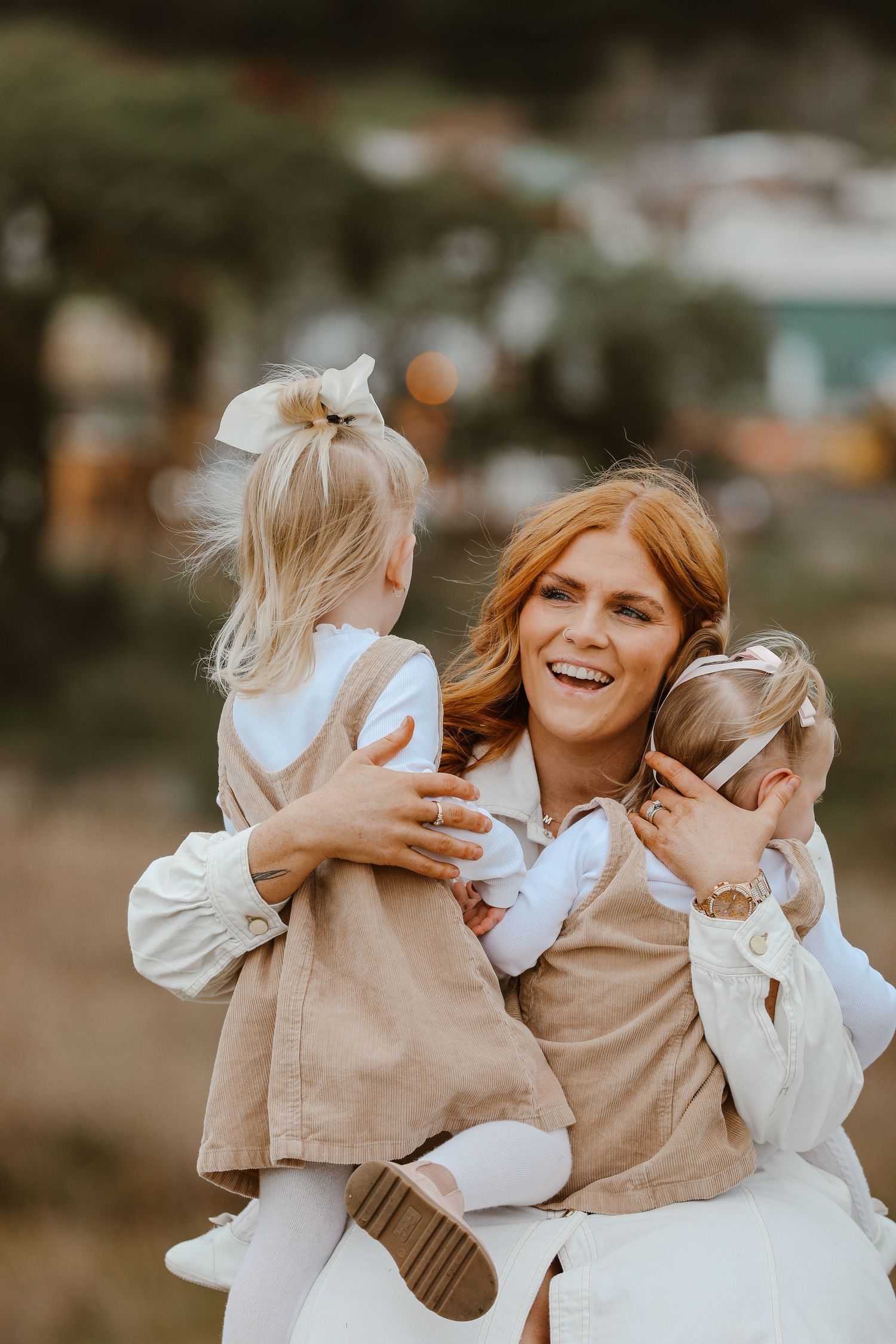 Joyful candid moments captured between parent and child playing outdoors.