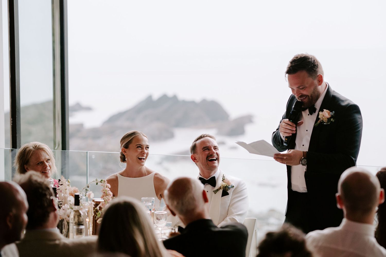 Best man giving speech at tunnels beach wedding venue in north devon