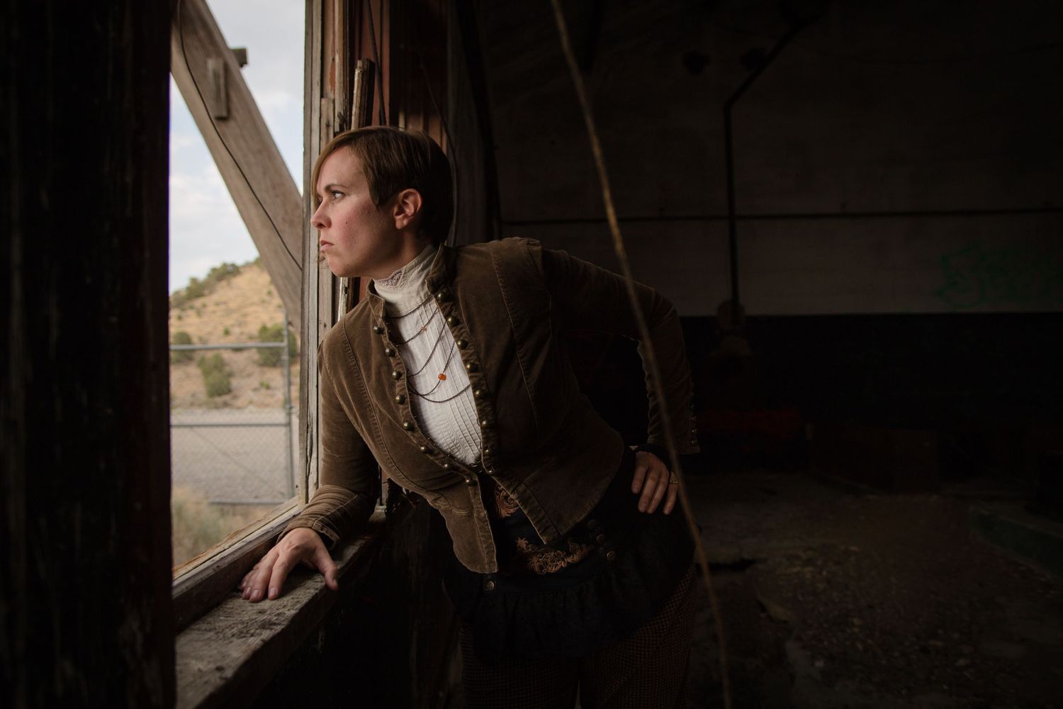abandoned mine in Eureka Utah, steampunk girl looks out window
