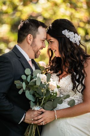 couple touching forehead together