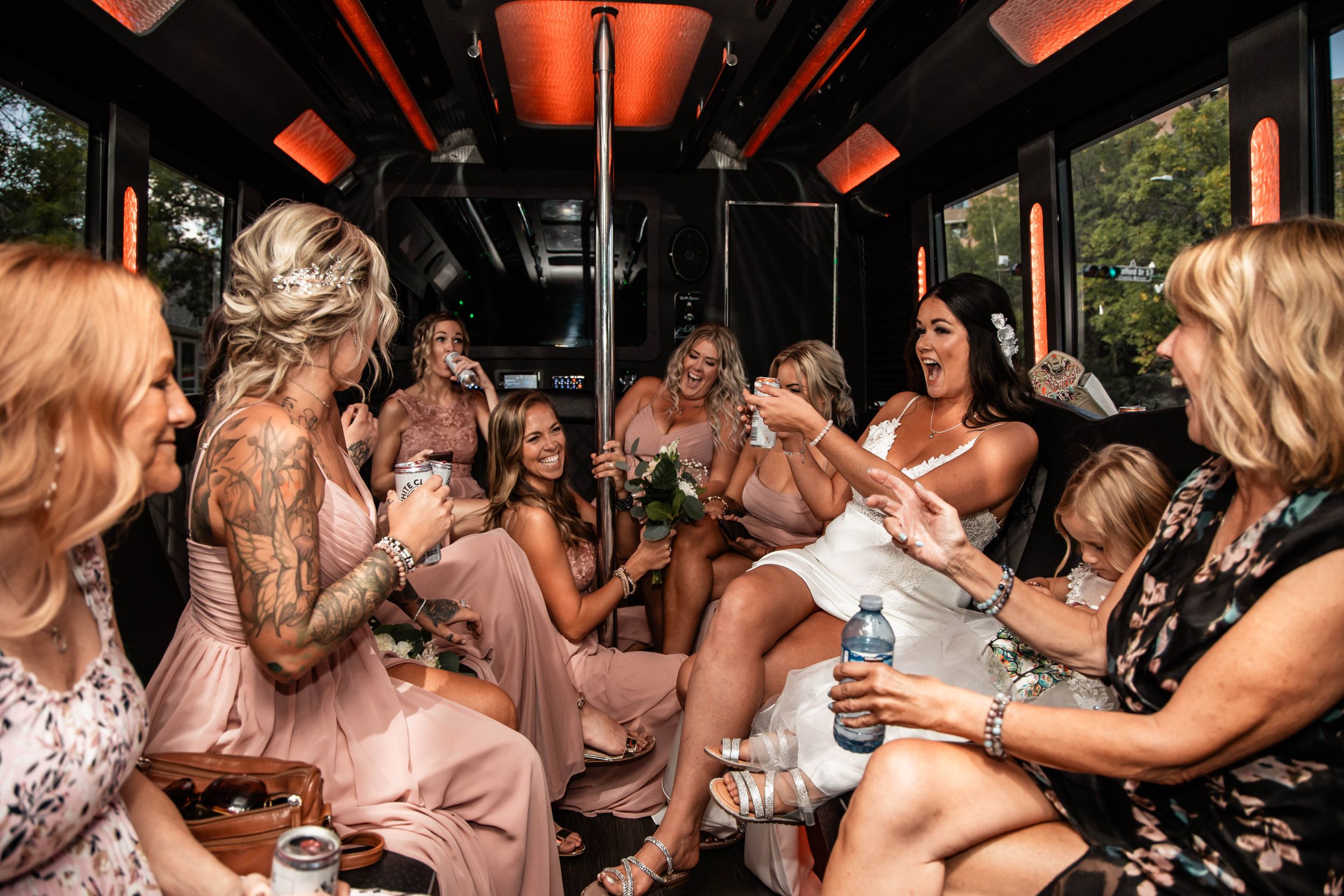 bride and her girls at limo bus