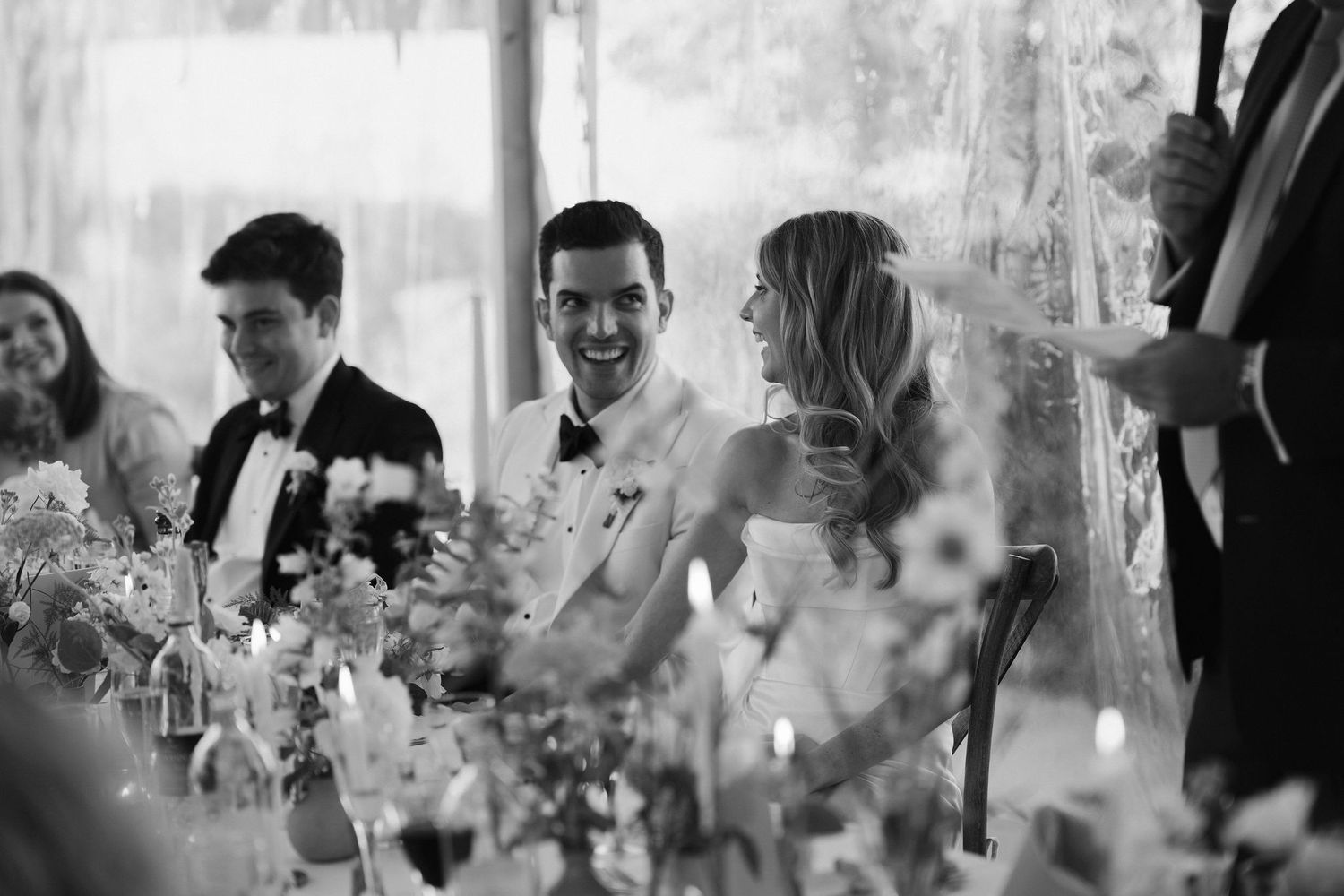 bride and groom laughing at fathers speech at hamswell house wedding in bath