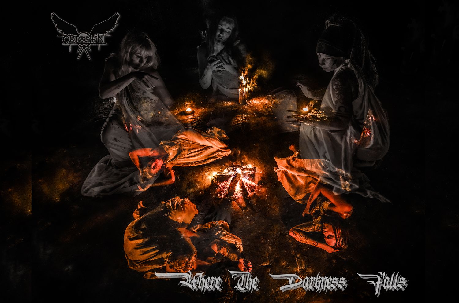Dark atmospheric photo of hooded figures gathered around a glowing campfire at night.