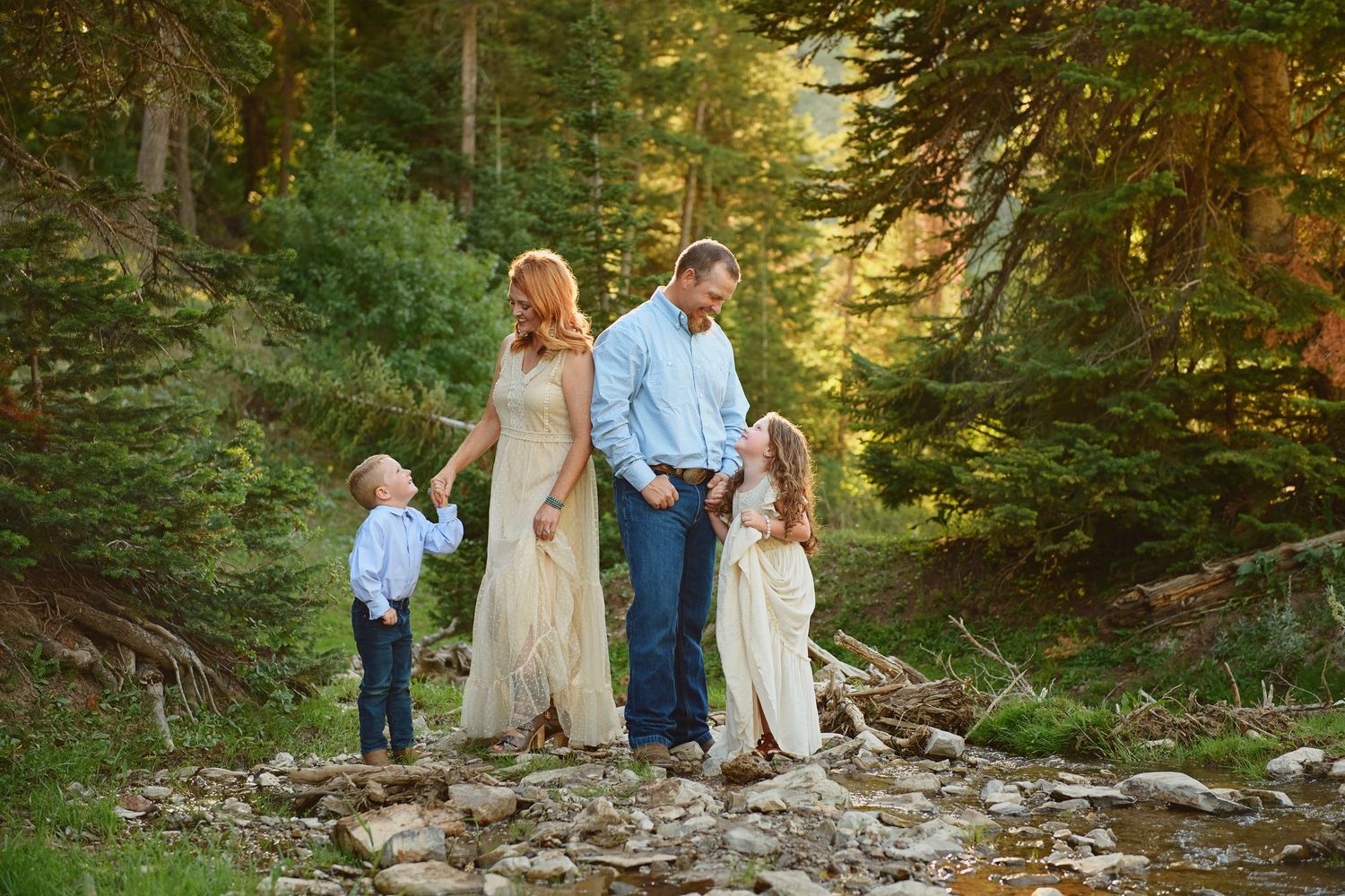 Timeless Family in black with fall colors in mountains near Idaho Falls, Blackfoot and Pocatello idaho
