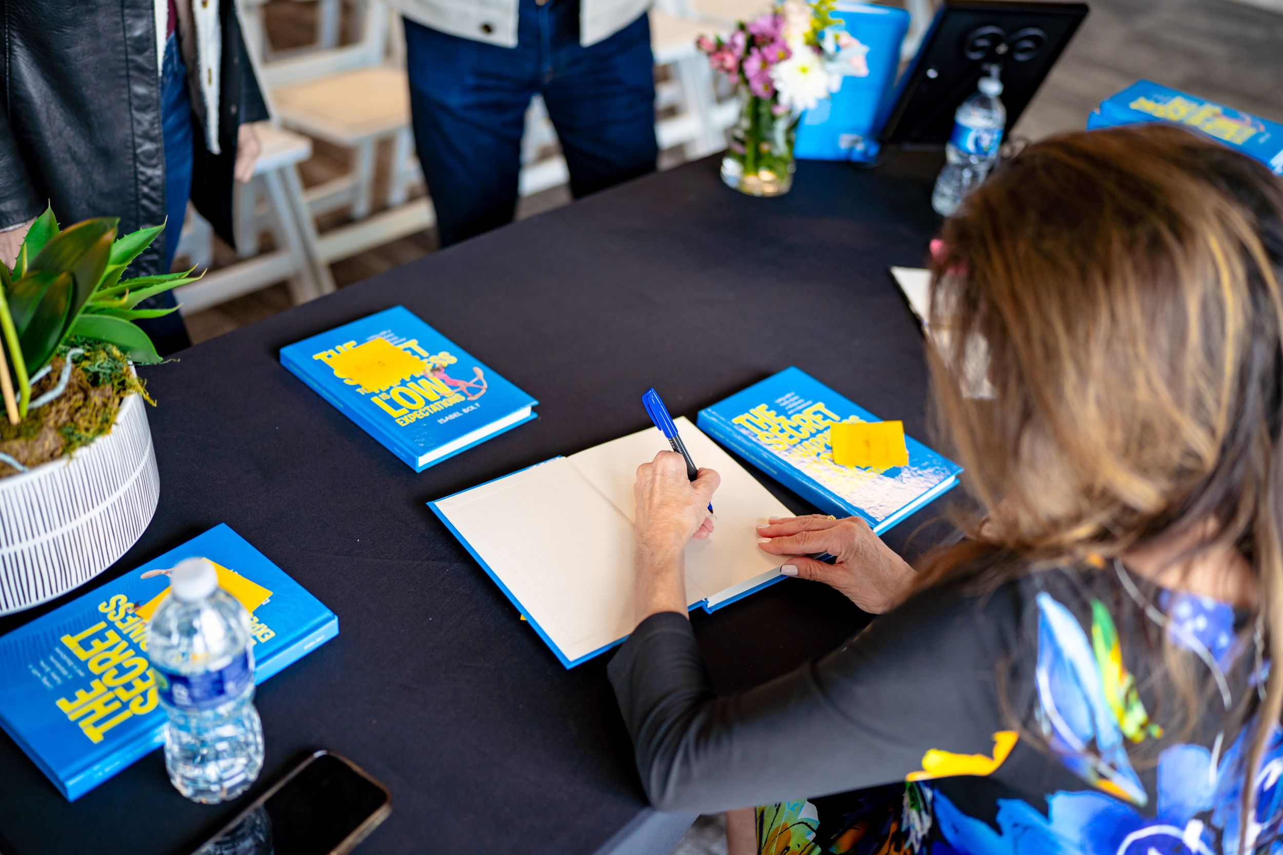 The Secret to Happiness is Low Expectations Book Signing with Isabel Bolt hosted by Randy White Real Estate in Southlake, Texas