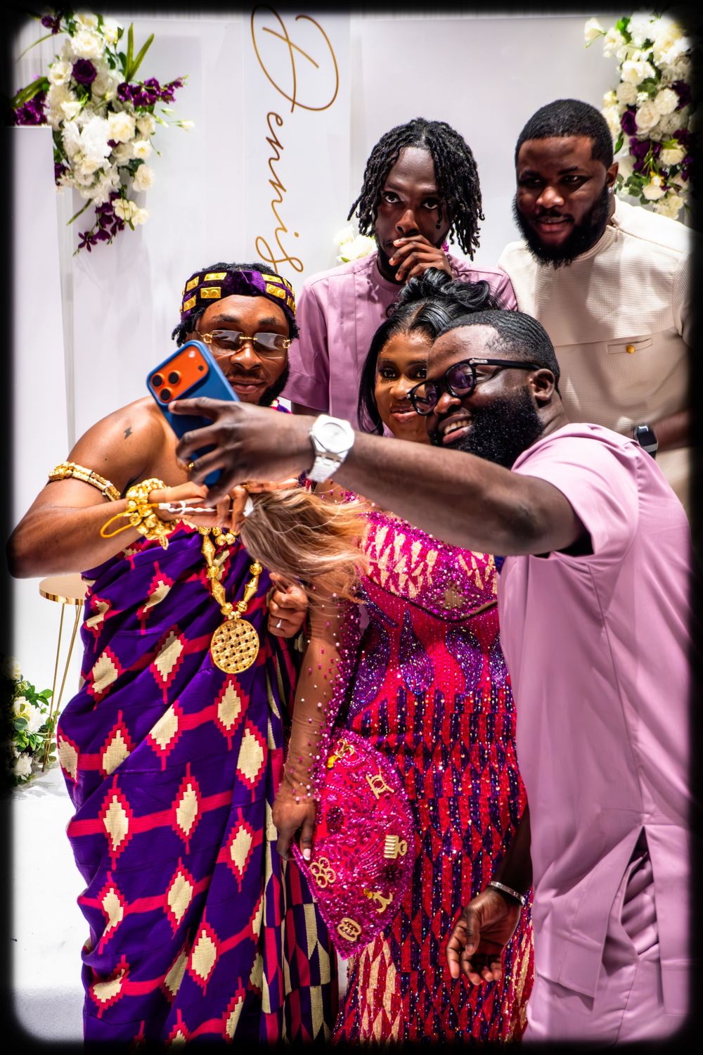 A joyful sequence of dance moves at a celebration showing colorful outfits in purple, orange and pink patterns.