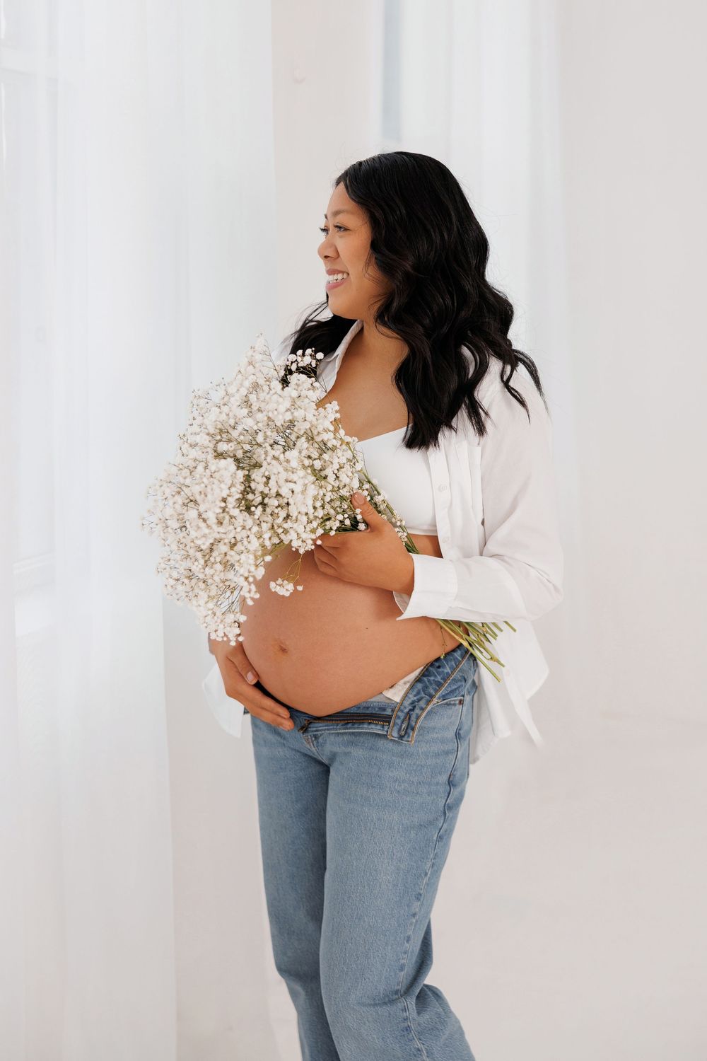 Luxury maternity photography in Chicago & suburbs featuring timeless studio and lifestyle portraits of expecting mothers.