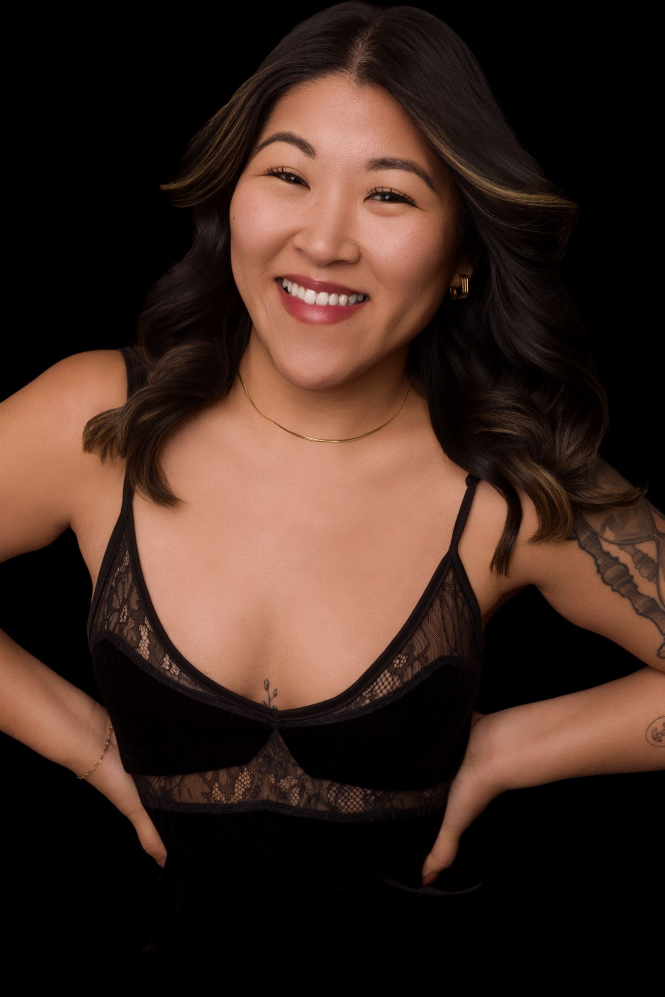 Portrait series showing joyful expressions and black lace attire against dark background in boudoir photography style.