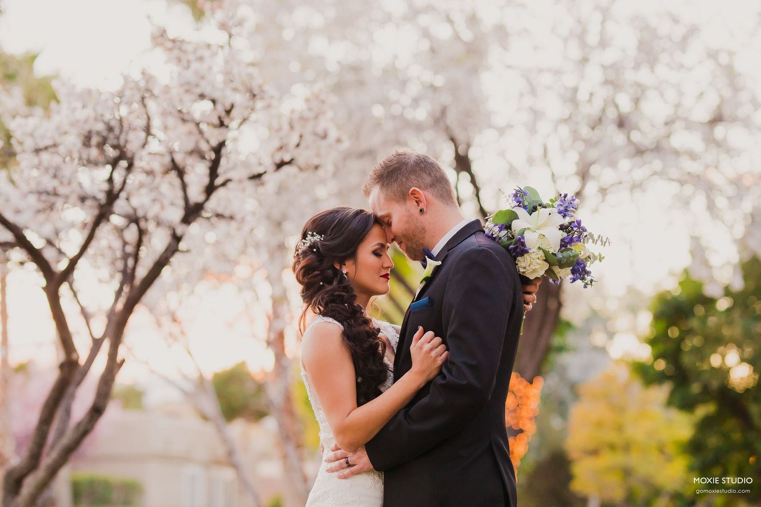 bride and groom portraits at DragonRidge Country Club sunset