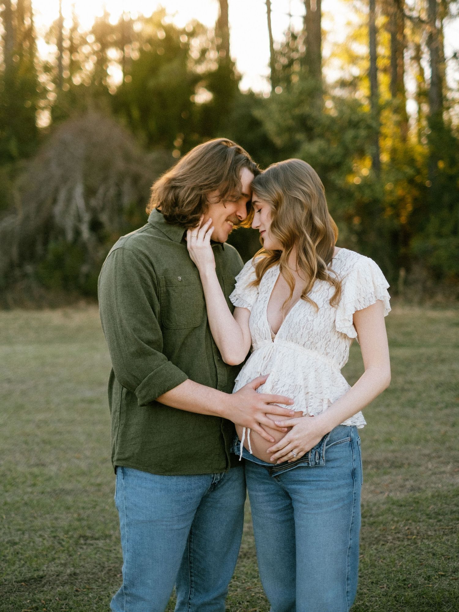 Golden hour maternity photography by duck pond at William F. Sheffield Regional Park North Jacksonville