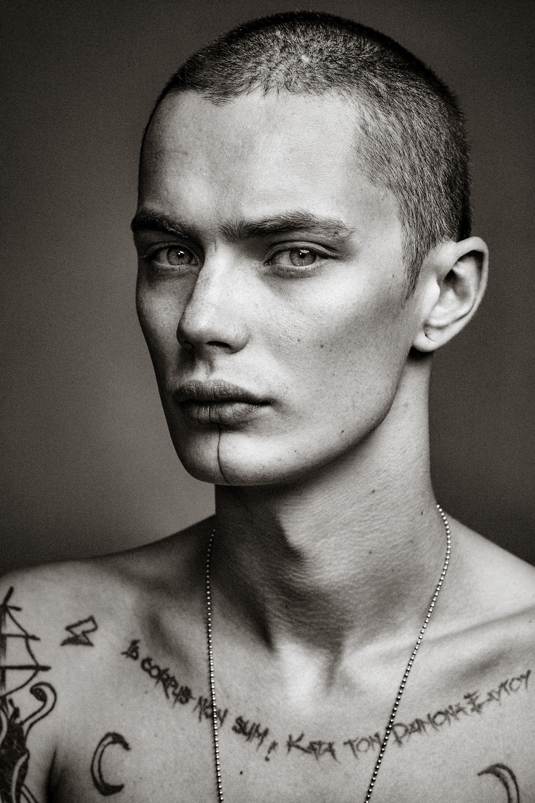 Black and white artistic portrait series showing close-up views of neck tattoos and facial features in dramatic lighting.