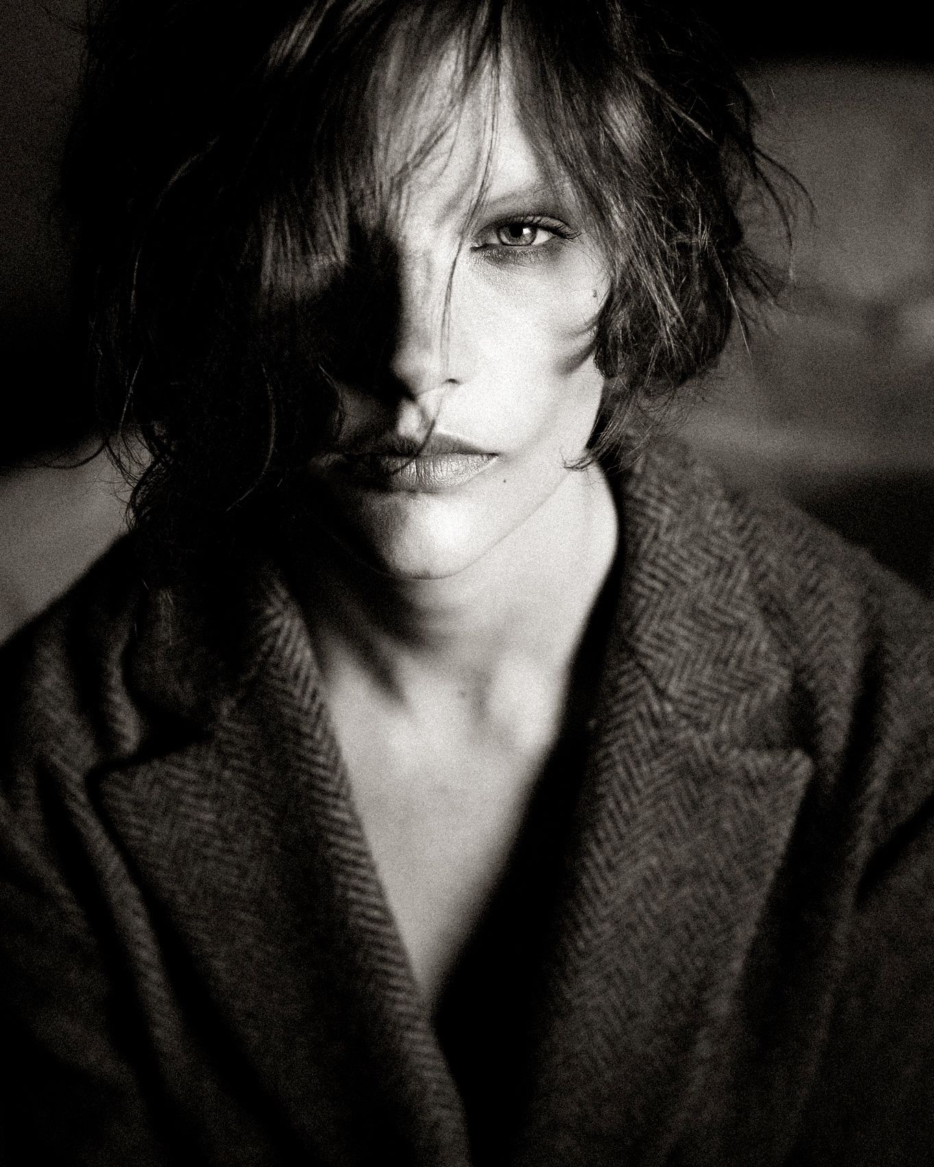 A dramatic black and white portrait series showing a figure in a tweed jacket with tousled hair against dark shadows.