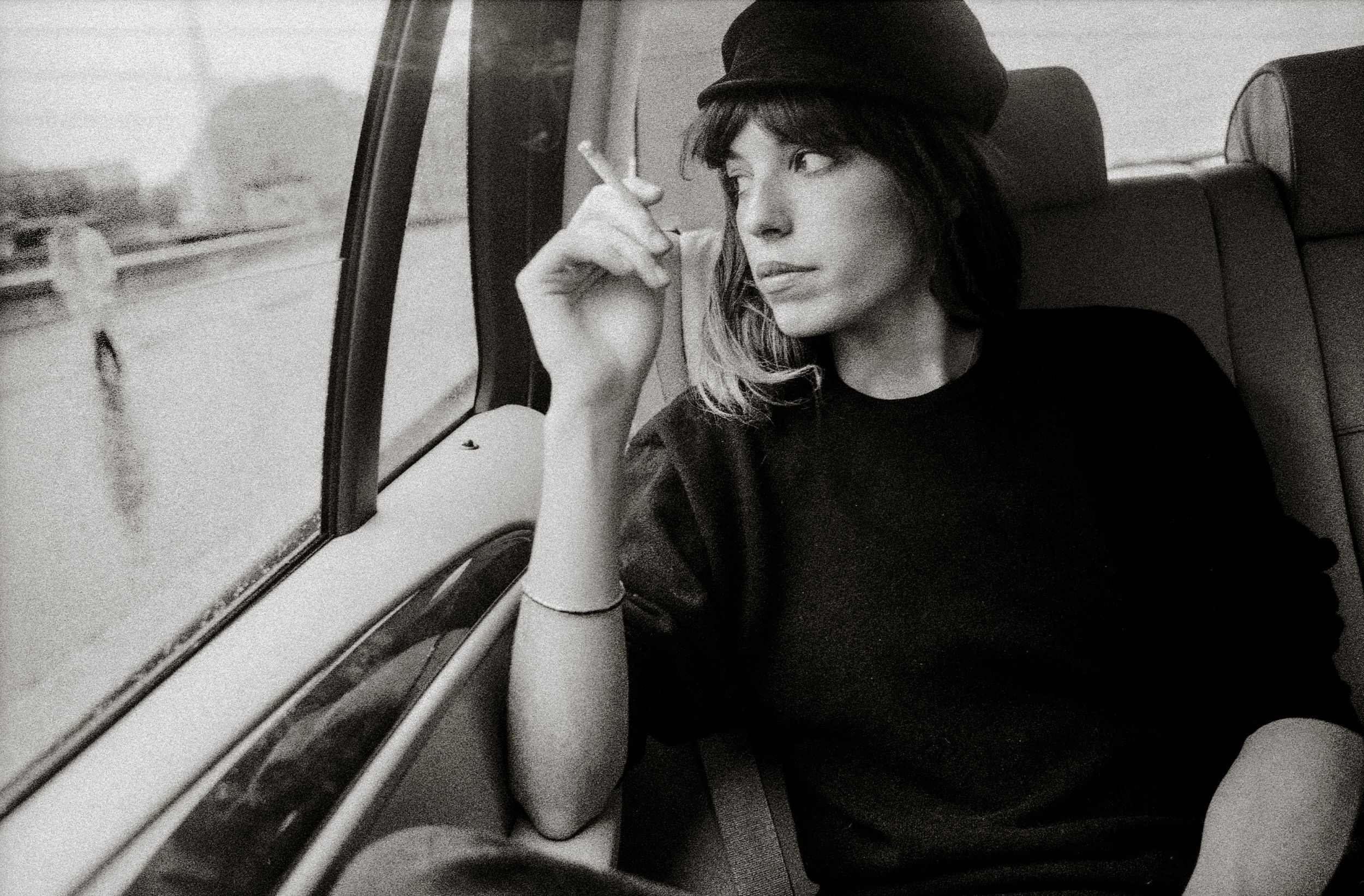 Black and white collage of people sitting near windows, creating a contemplative mood.