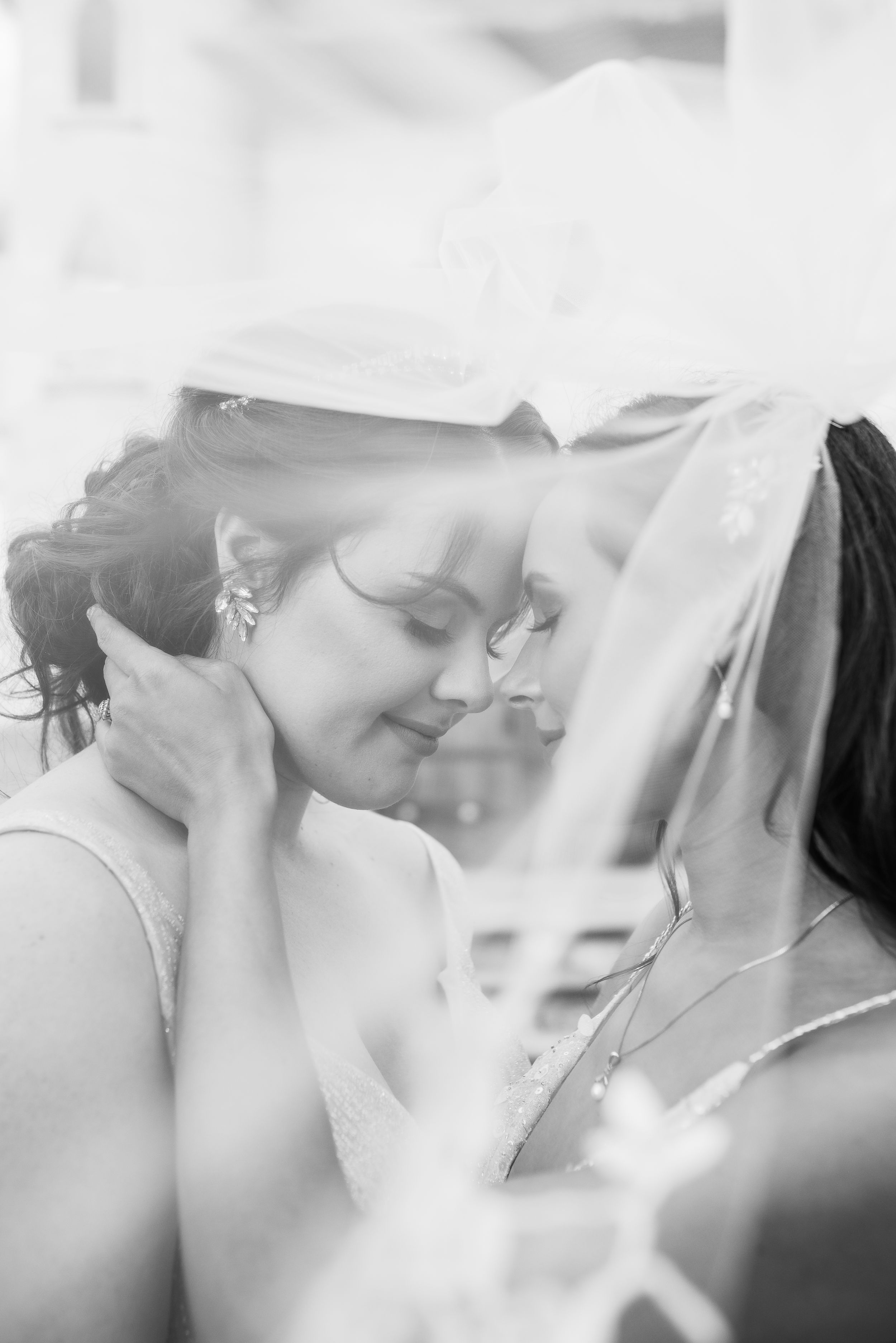 A romantic black and white photo sequence showing a tender intimate moment between a couple.