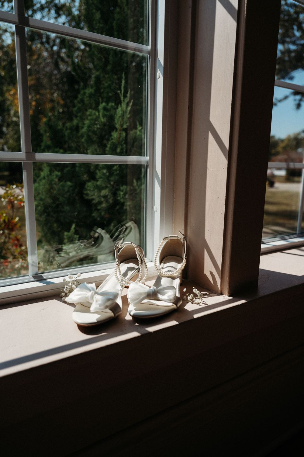 Wedding shoes on the window sill of Sister Hill in Manchester Iowa