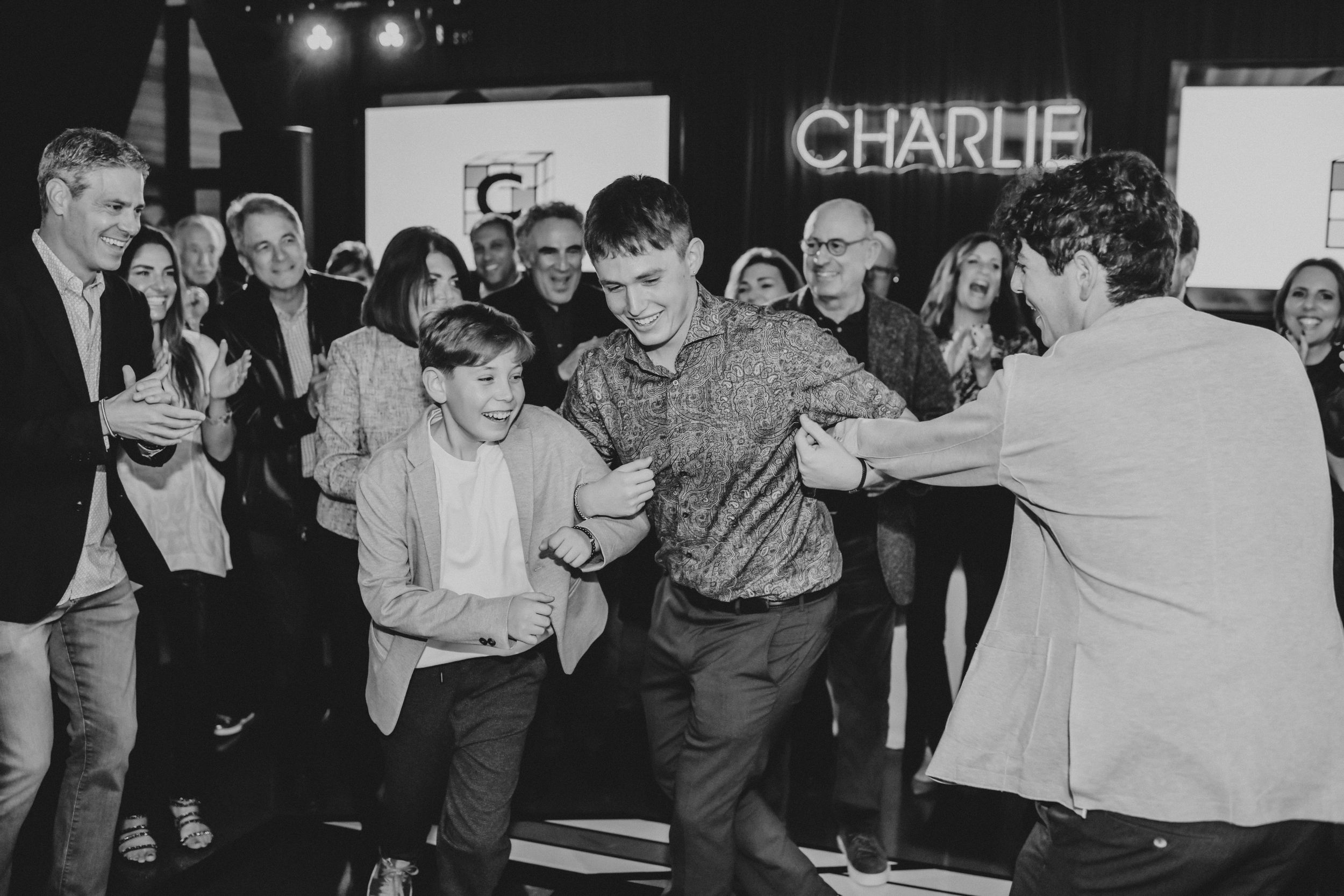 Guests dancing during Bar Mitzvah reception photographed in San Diego