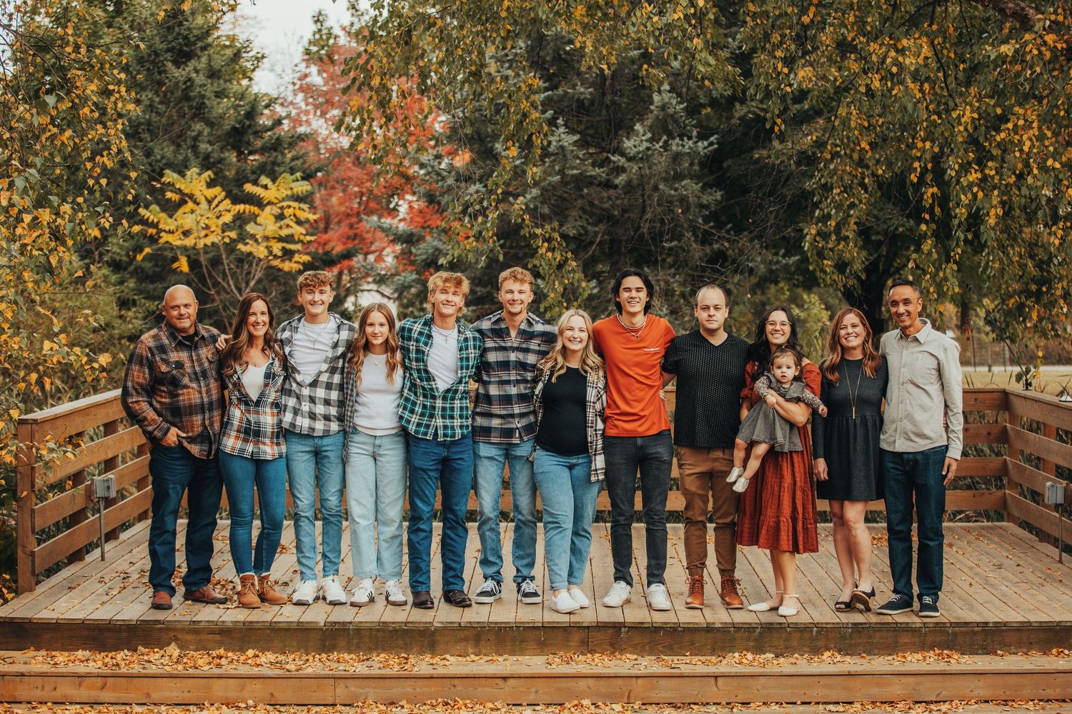 Large family standing on a deck