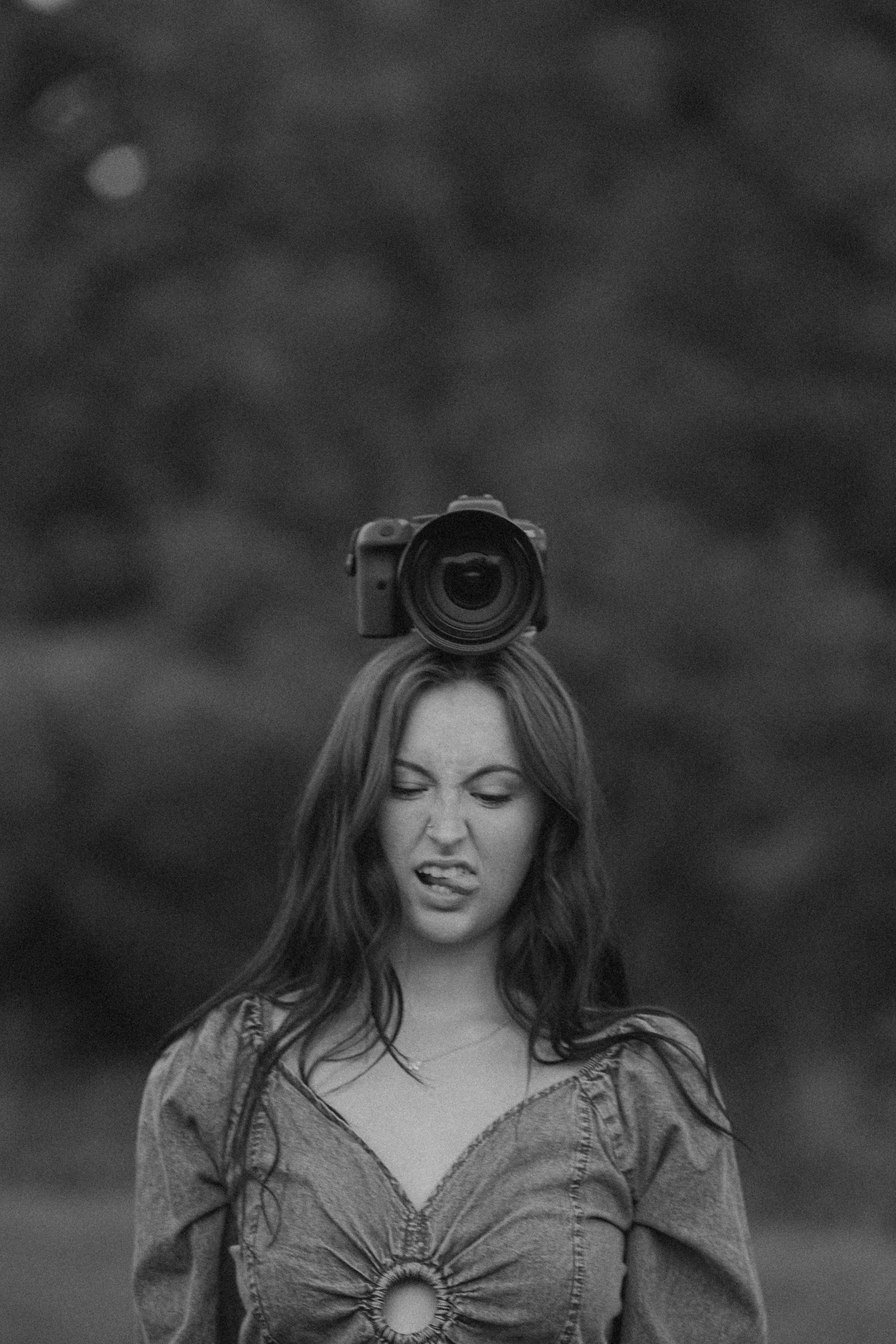 Artistic black and white portrait series showing dynamic poses and expressions.