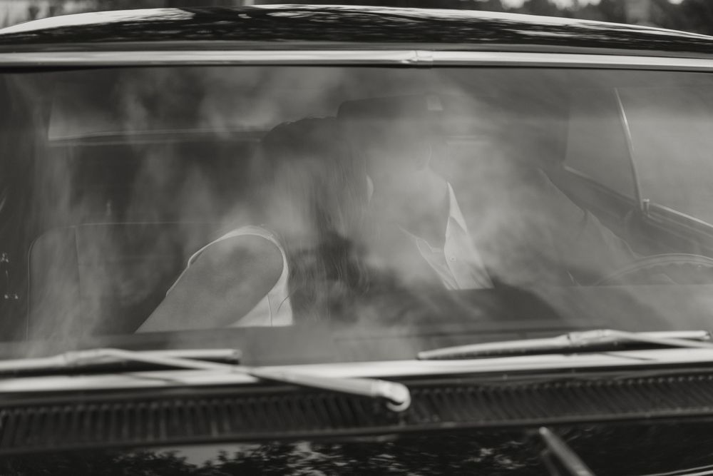 Multiple close-up shots of a cracked car windshield showing spider web patterns in the damaged glass.