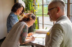 Quad Cities Wedding Photography Signing official documents