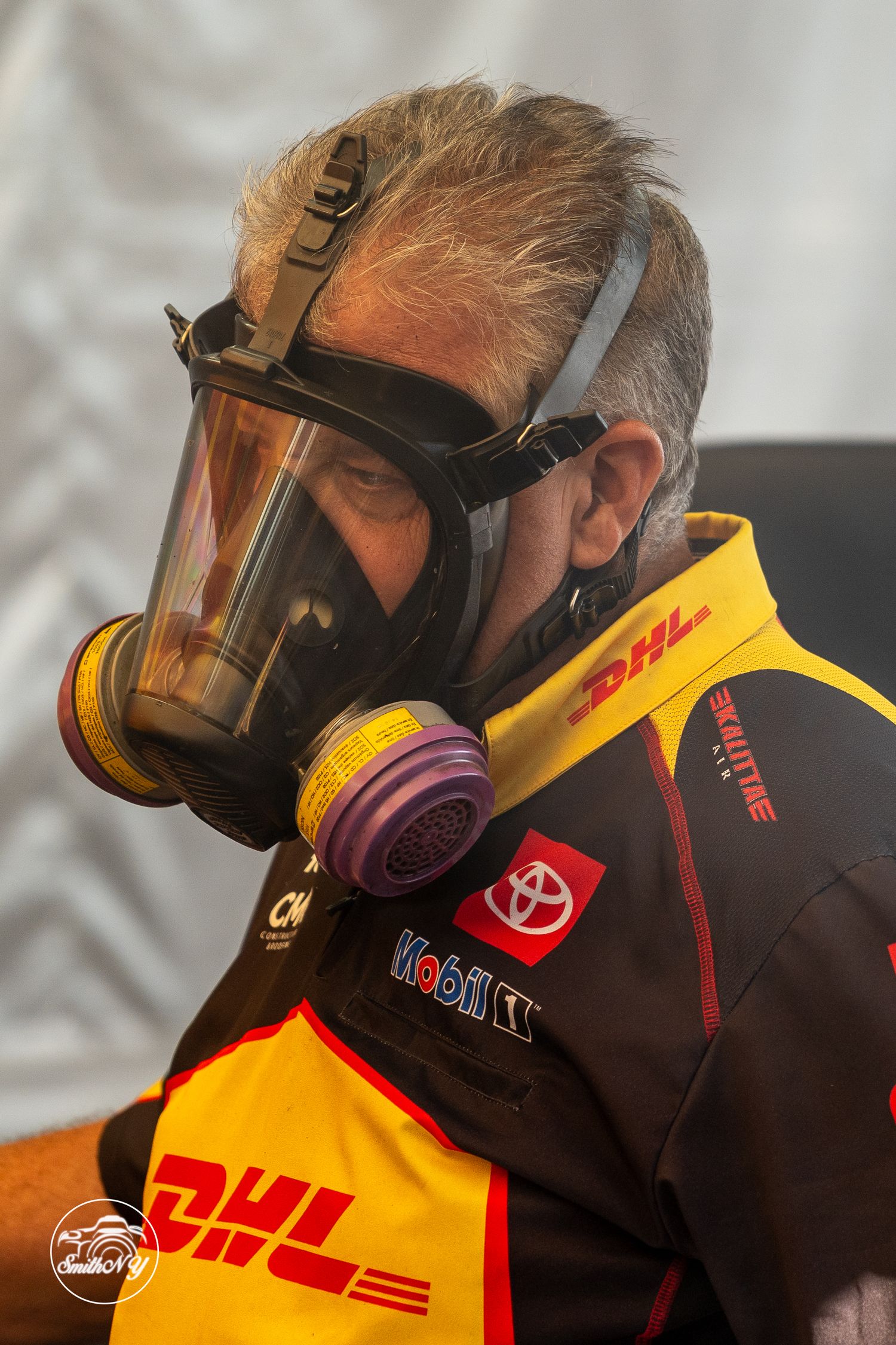 "Trackside moments captured in motion—authentic race day photography with pit lane energy and raw motorsport emotion."