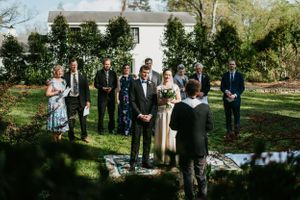 Wedding party during an intimate backyard wedding ceremony in Chapel Hill NC