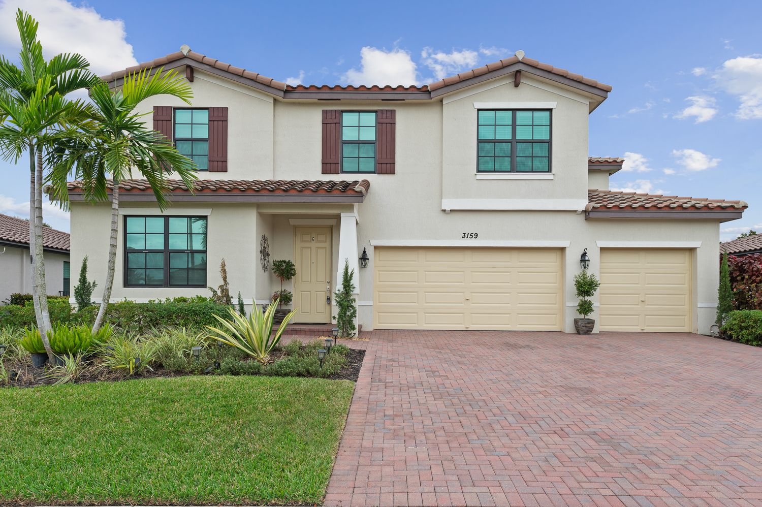 Arden home exterior captured with drone aerial real estate photography. Real estate photographer in Palm Beach County