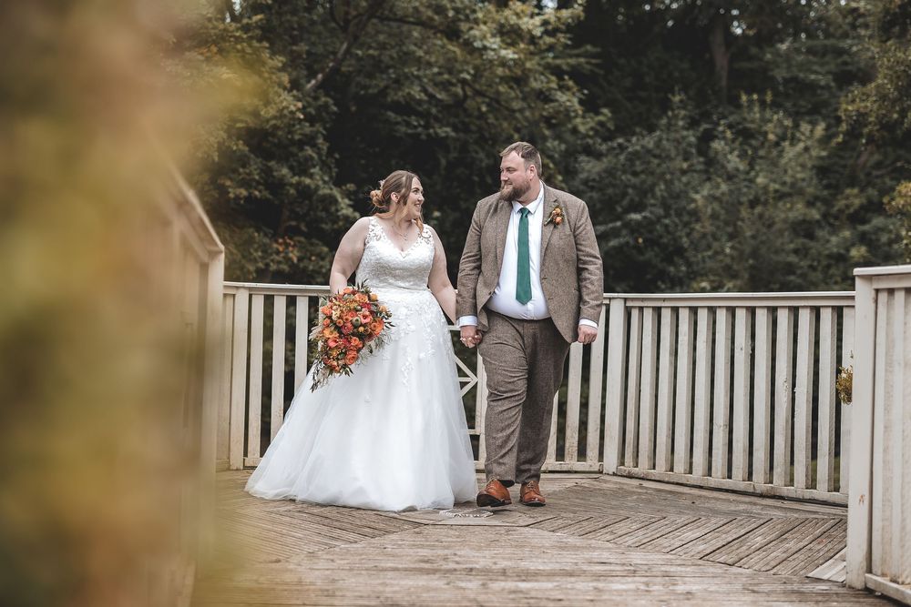 A natural relaxed moment for a wedding couple as they take a moment together on their wedding day.