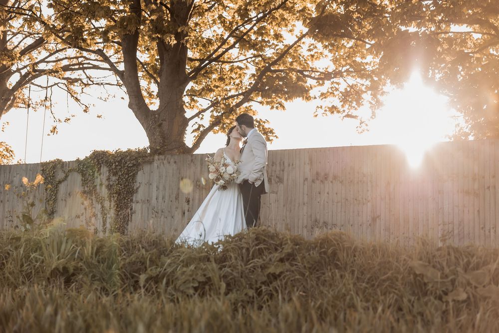 A relaxed couple portrait during a Yorkshire sunset at Beverley barn.