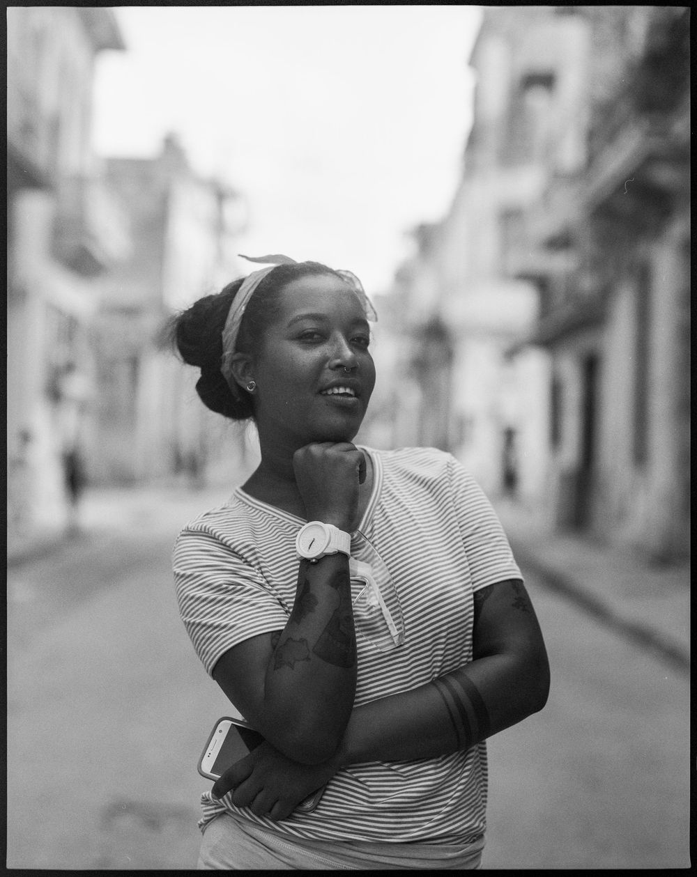Black and white street photography capturing movement and emotion.