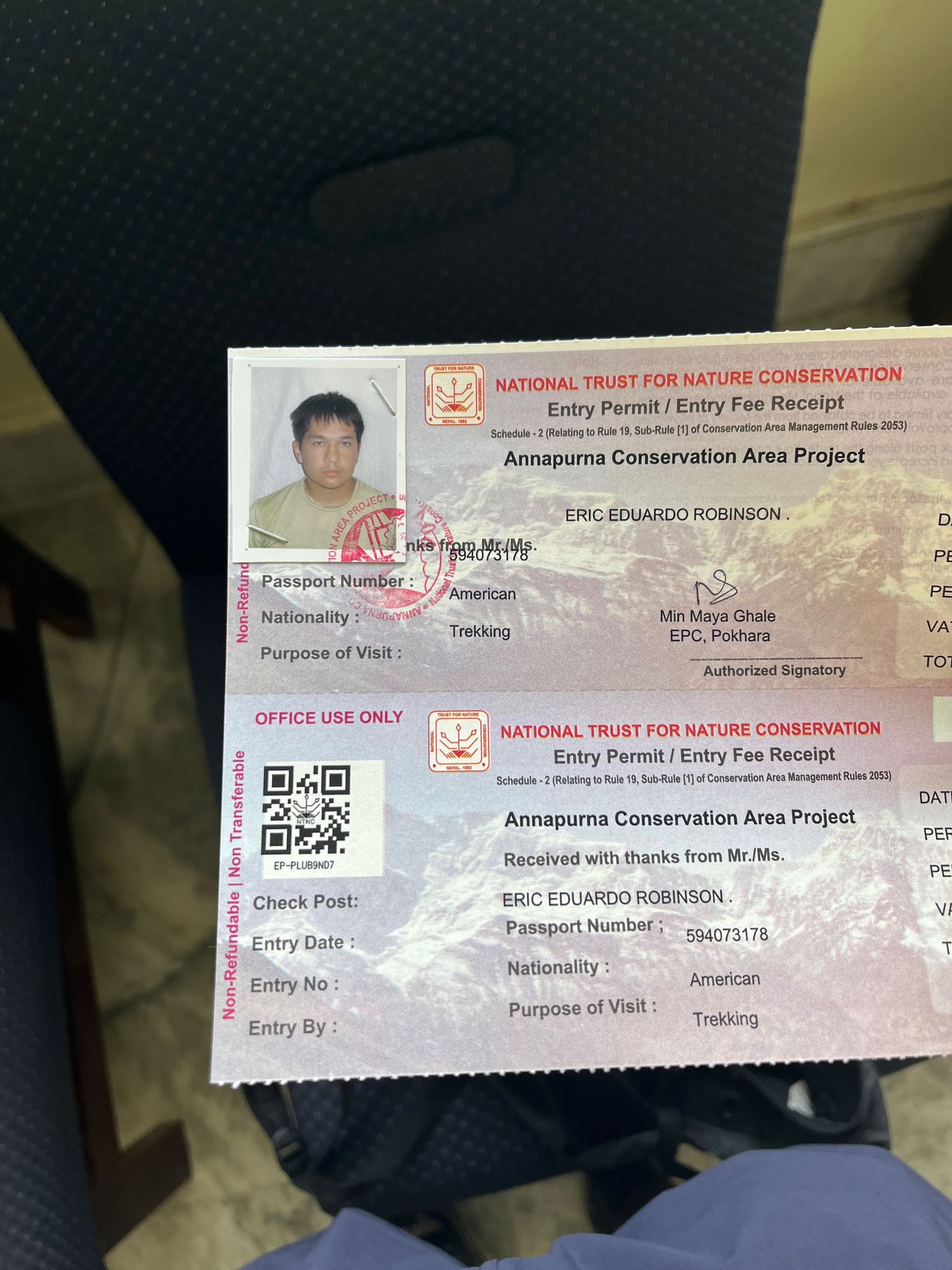 Conservation area entry tickets with QR codes and project details displayed on white paper.