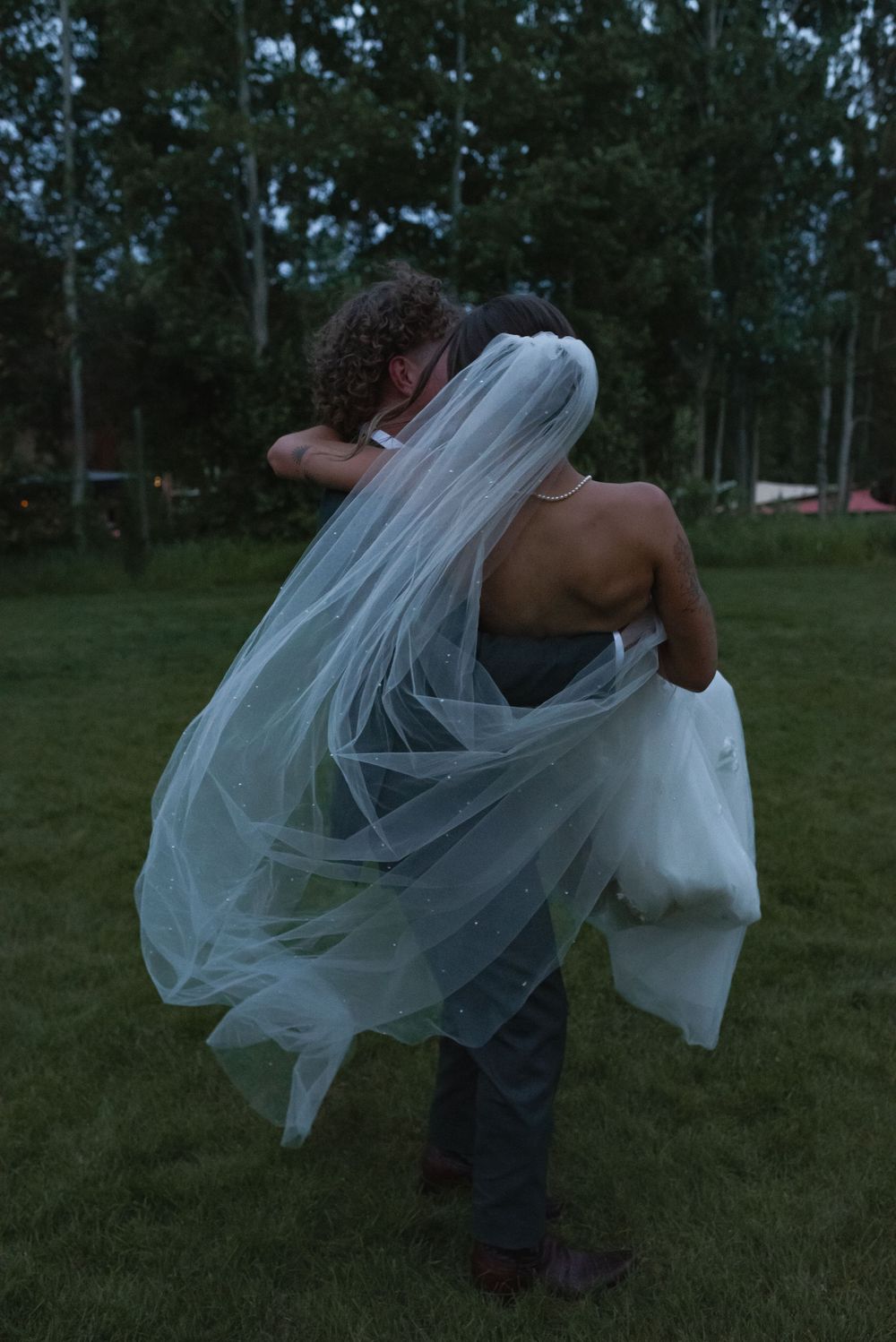 A sequence of four photos shows a flowing white veil being tossed and swirled against a green outdoor background.