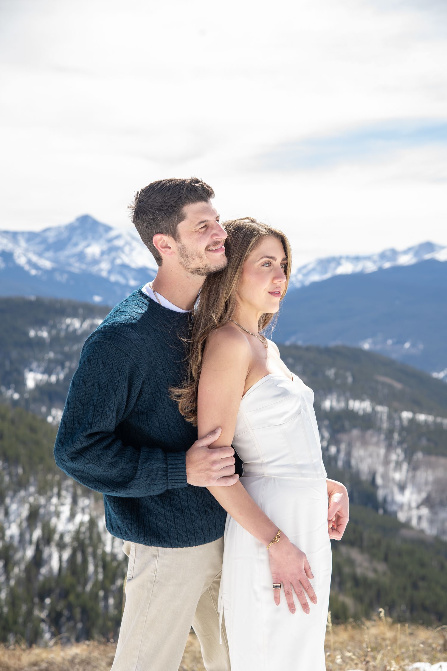 Moody engagement photos of chic fashionable couple in Vail Colorado.