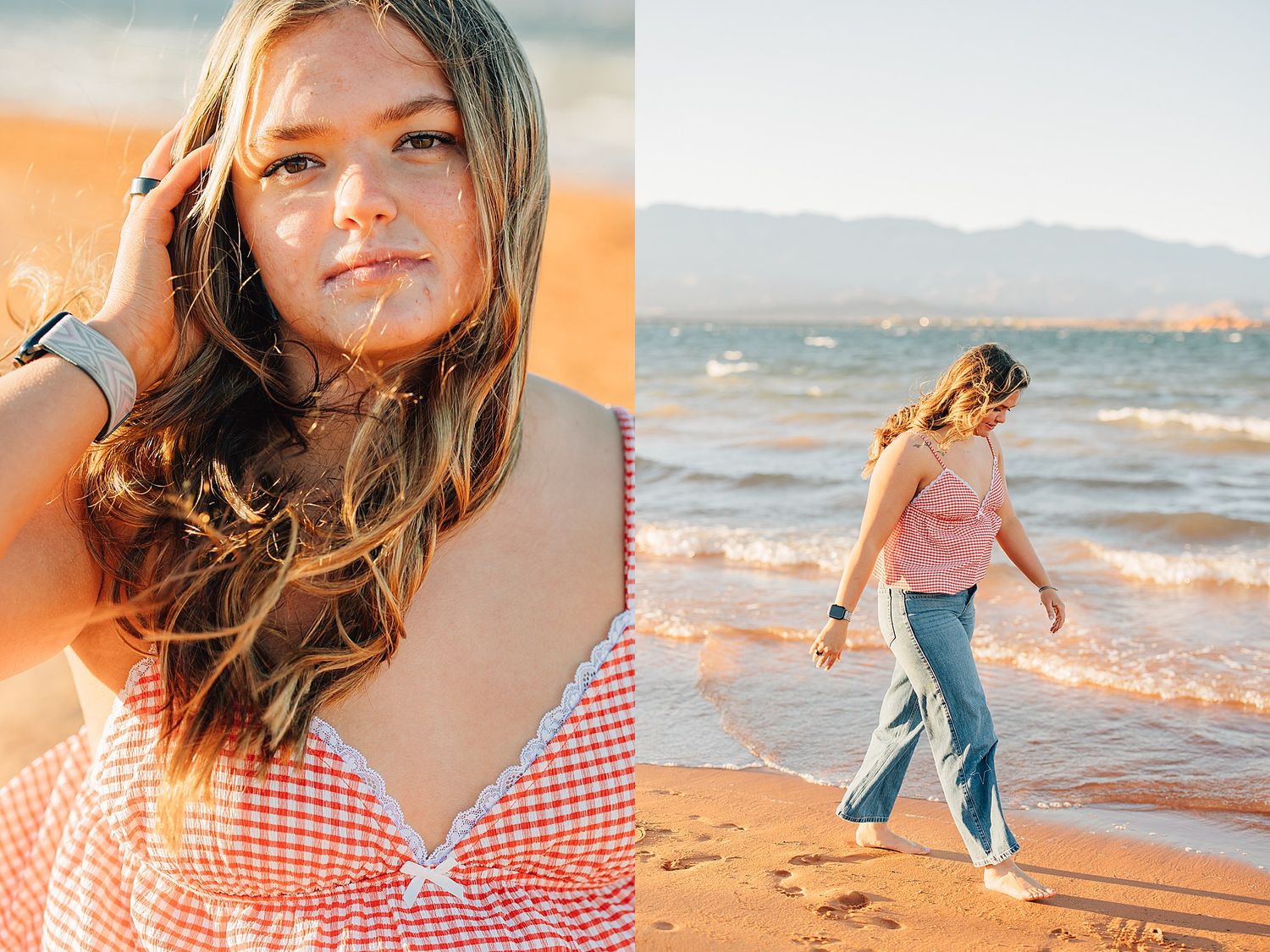 Young woman with long hair in red gingham top walks along sandy beach at golden hour with mountains in background.