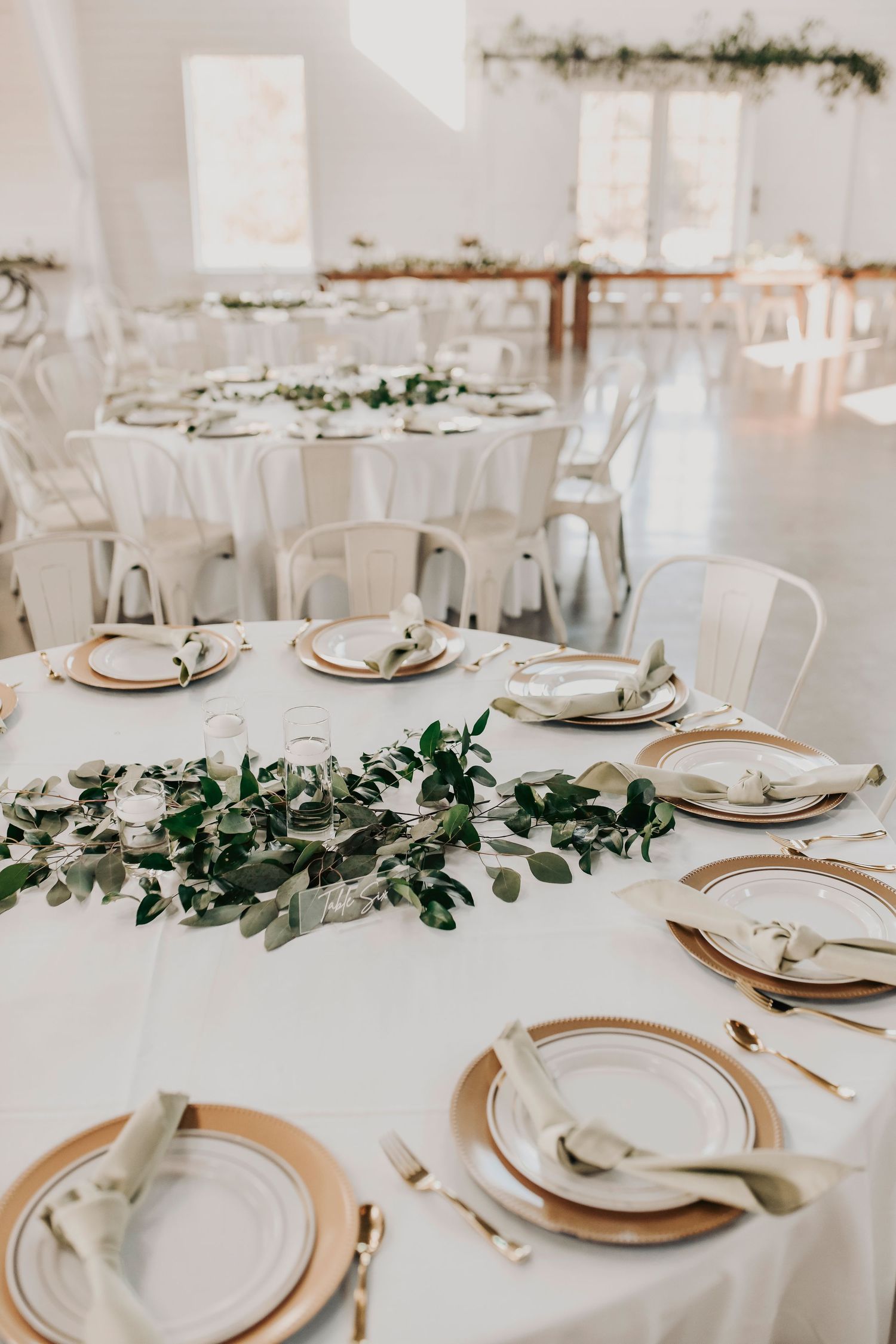 Barn wedding centerpieces greenery decor