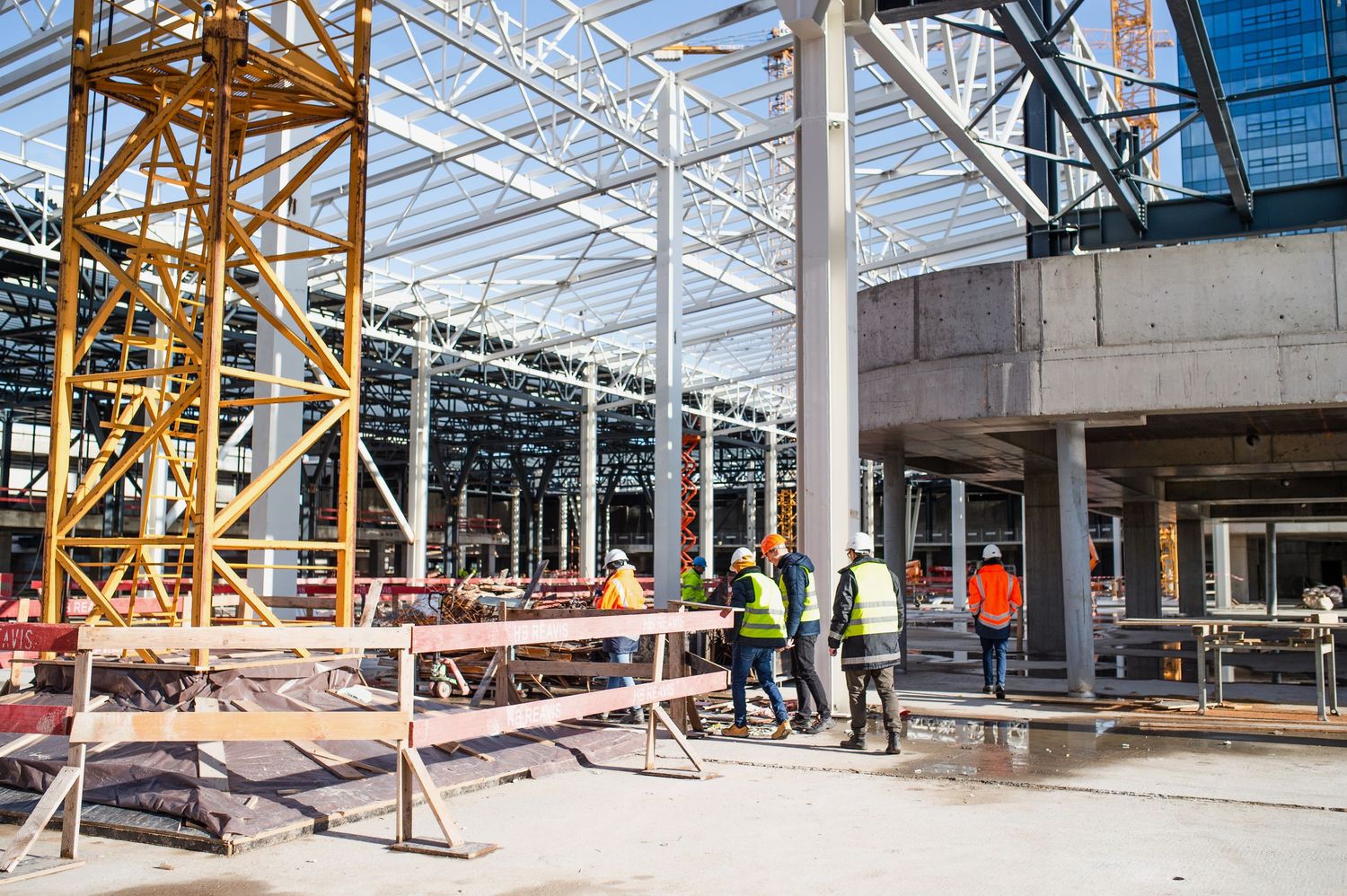 Construction site progress pictures interior showing steel framework.