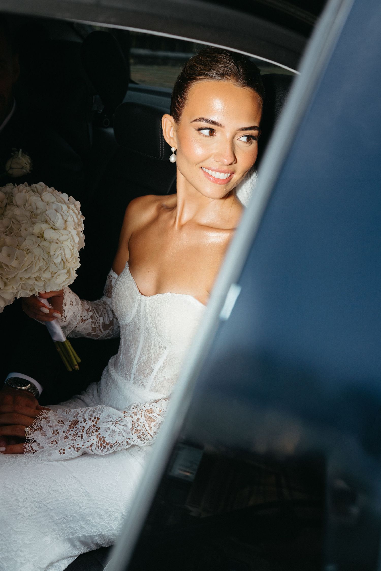 Bride and groom in the corridors of Winchester registry office, taken by editorial wedding photographer based in Hampshire