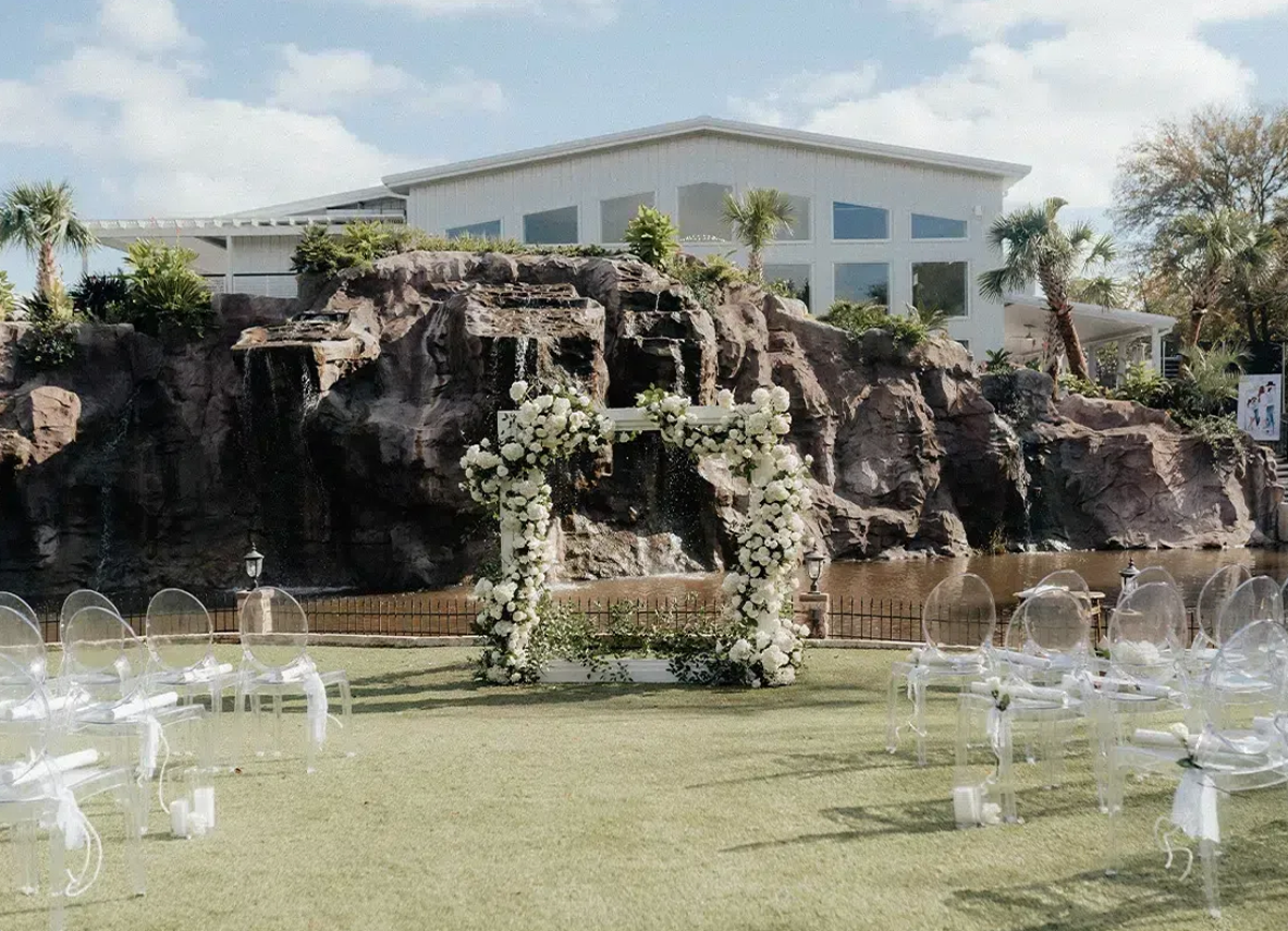 Ceremony setup in front of a water feature at the Dallas Oasis, a Dallas wedding venue